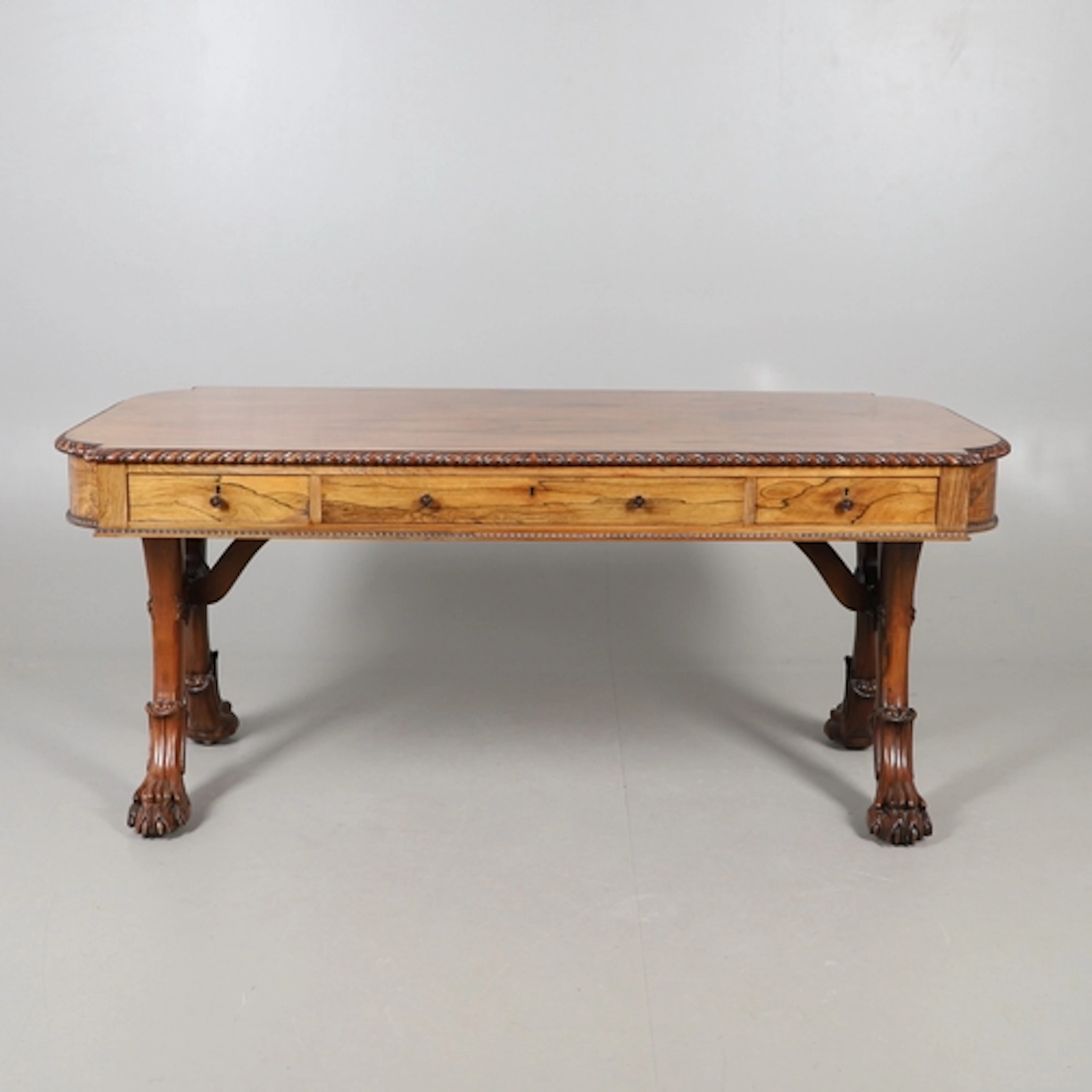 A WILLIAM IV ROSEWOOD PARTNERS' LIBRARY TABLE IN THE MANNER ...