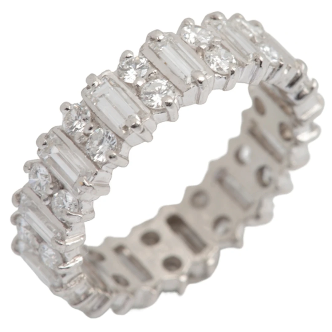 A diamond eternity ring, designed as a continuous band of ba...