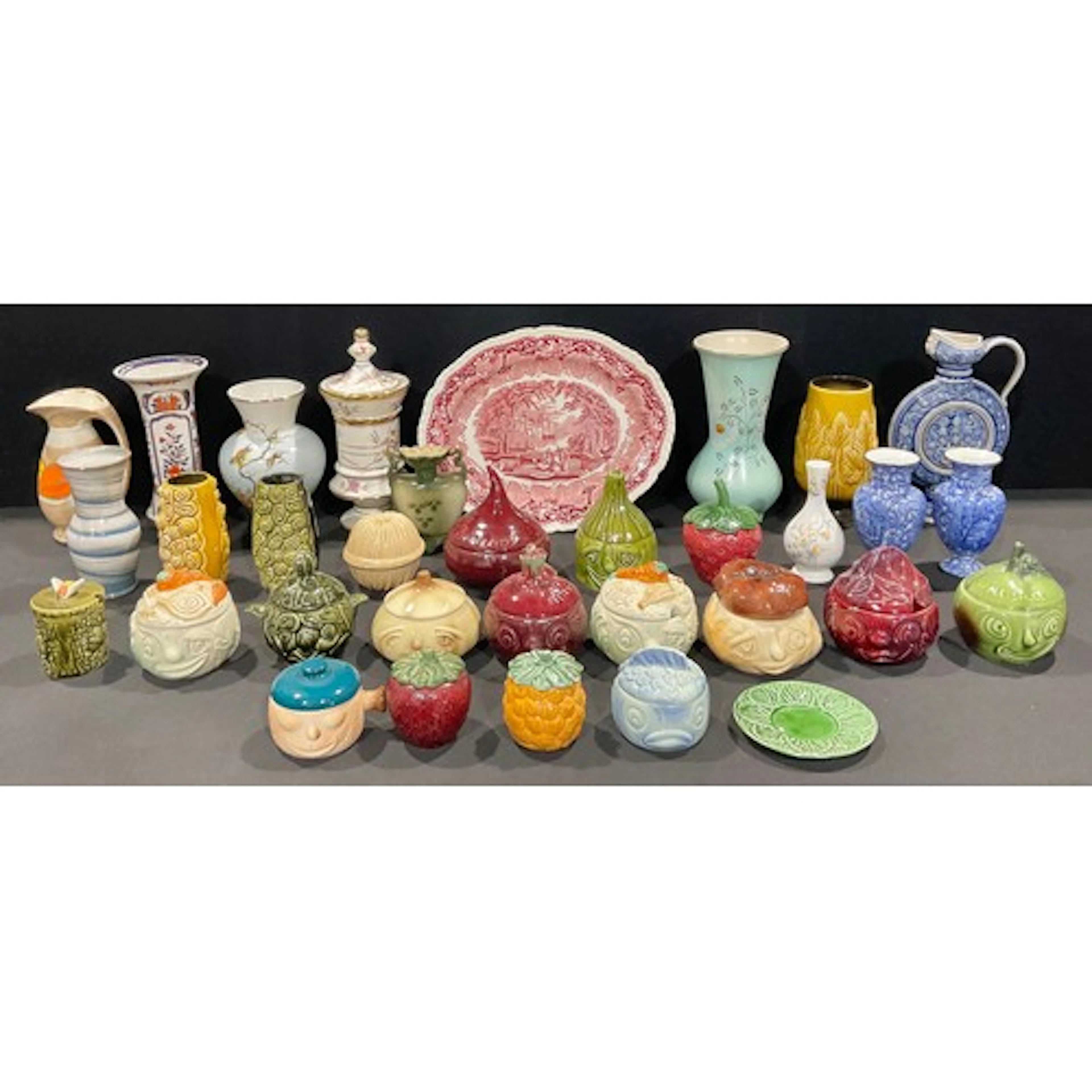 A collection of Sylvac face pots, including Bread, Beetroot,...