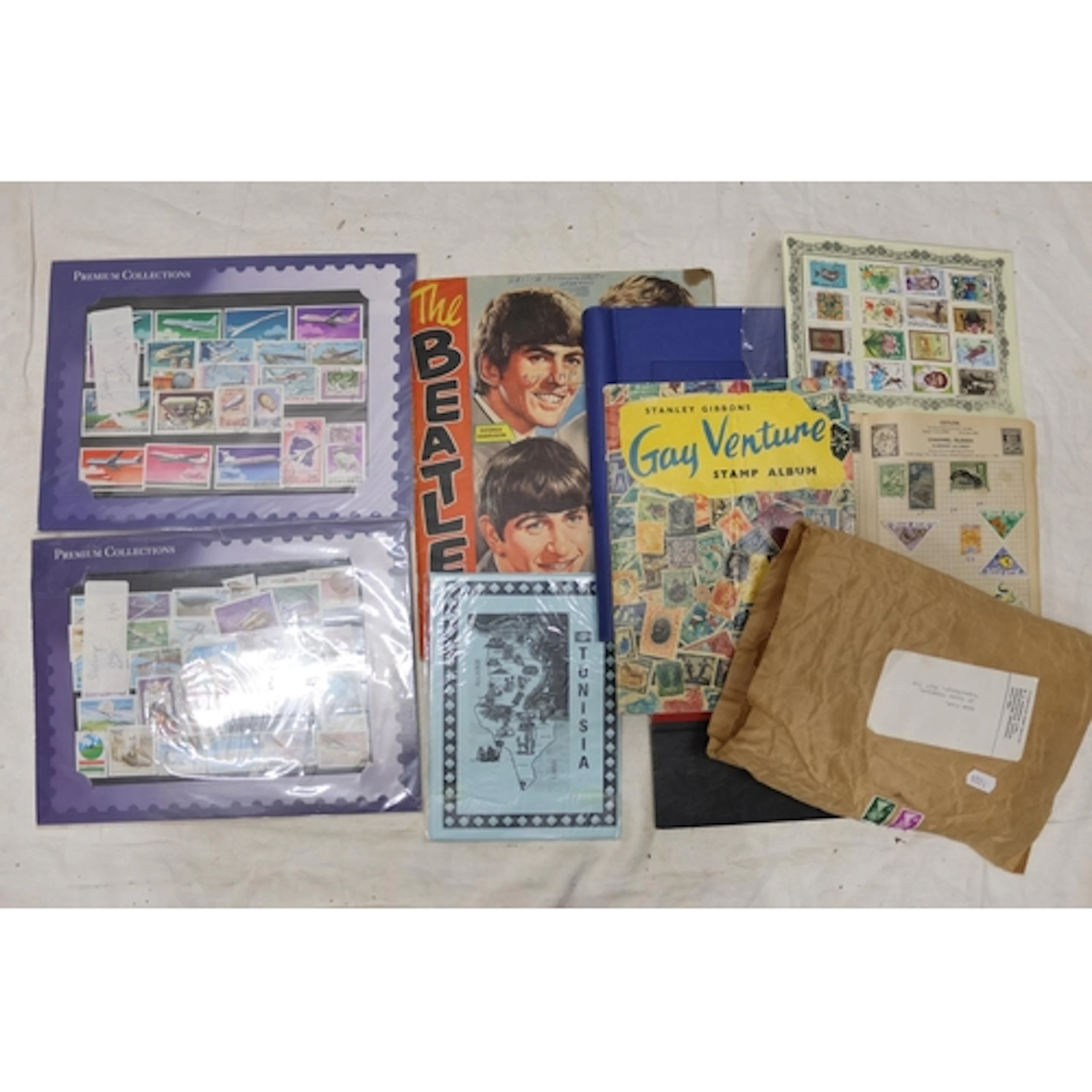 Stamp collection held over 3+ albums and loose to include Th...