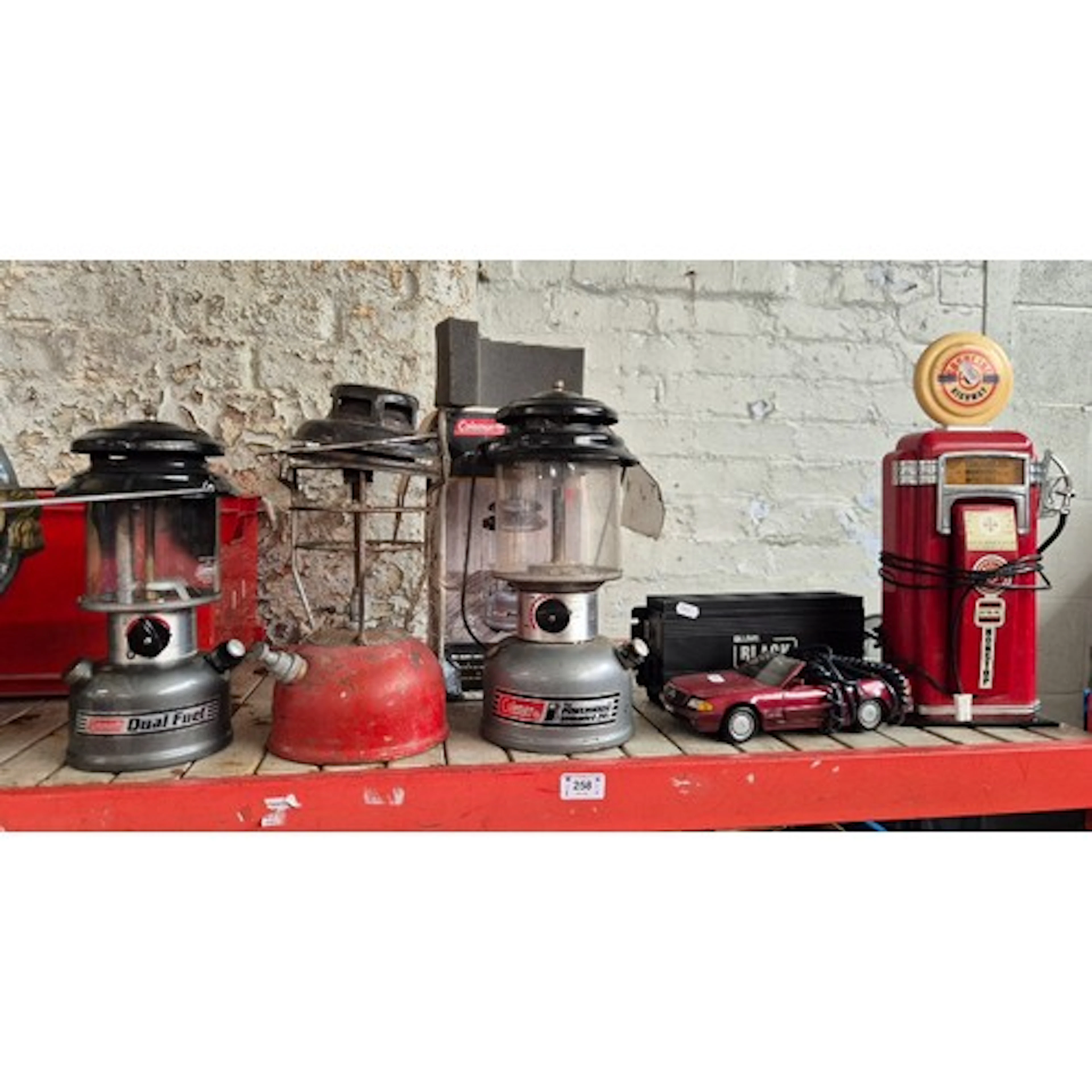 3 paraffin lamps, a Luumi Black lamp, and 2 novelty telephon...