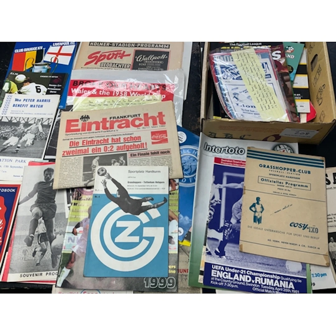 Football Programme Box: Includes a small selection of club r...