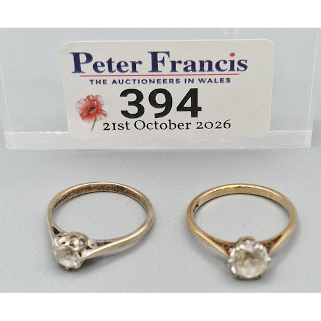 9ct gold and 9ct gold and platinum clear stone solitaire rin...