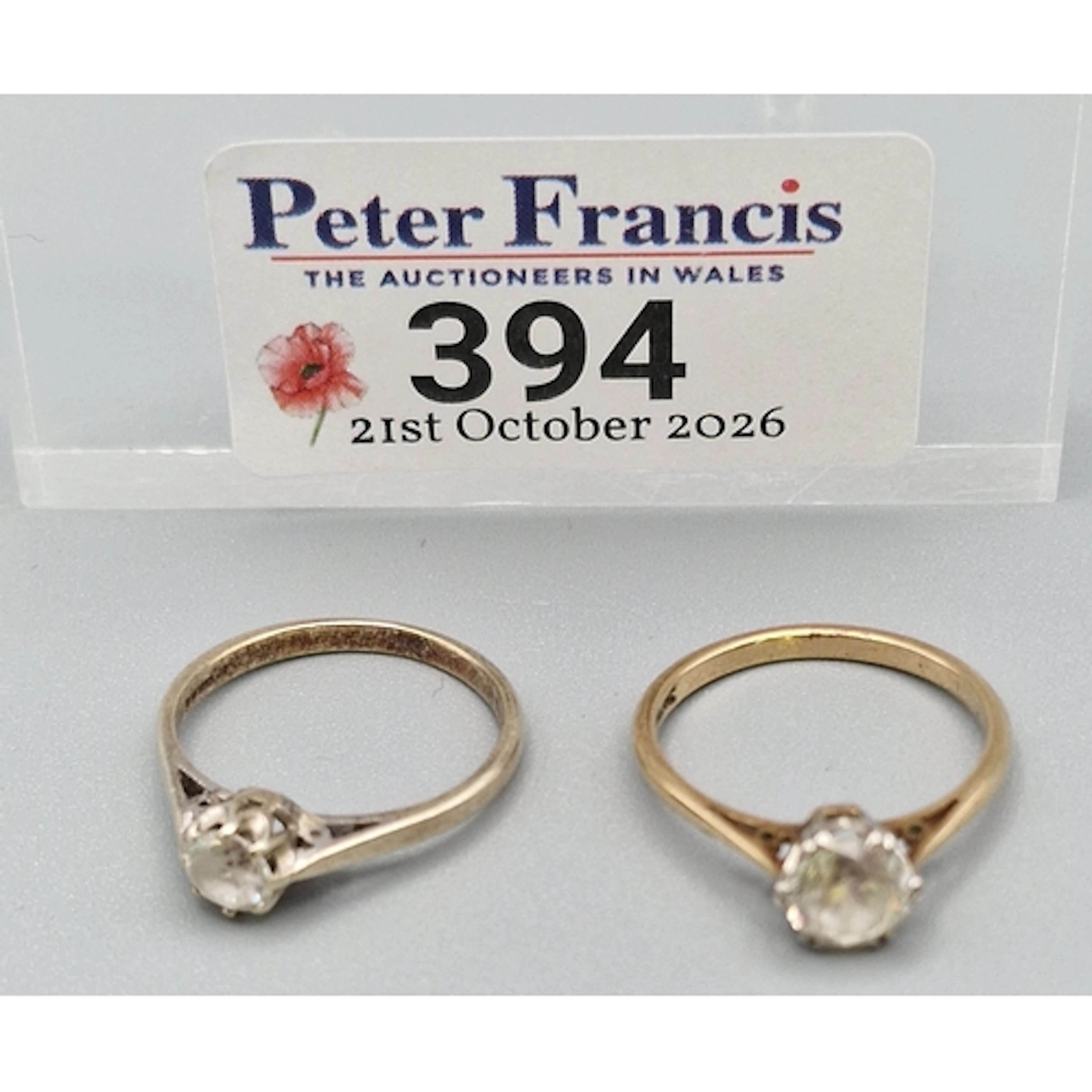9ct gold and 9ct gold and platinum clear stone solitaire rin...