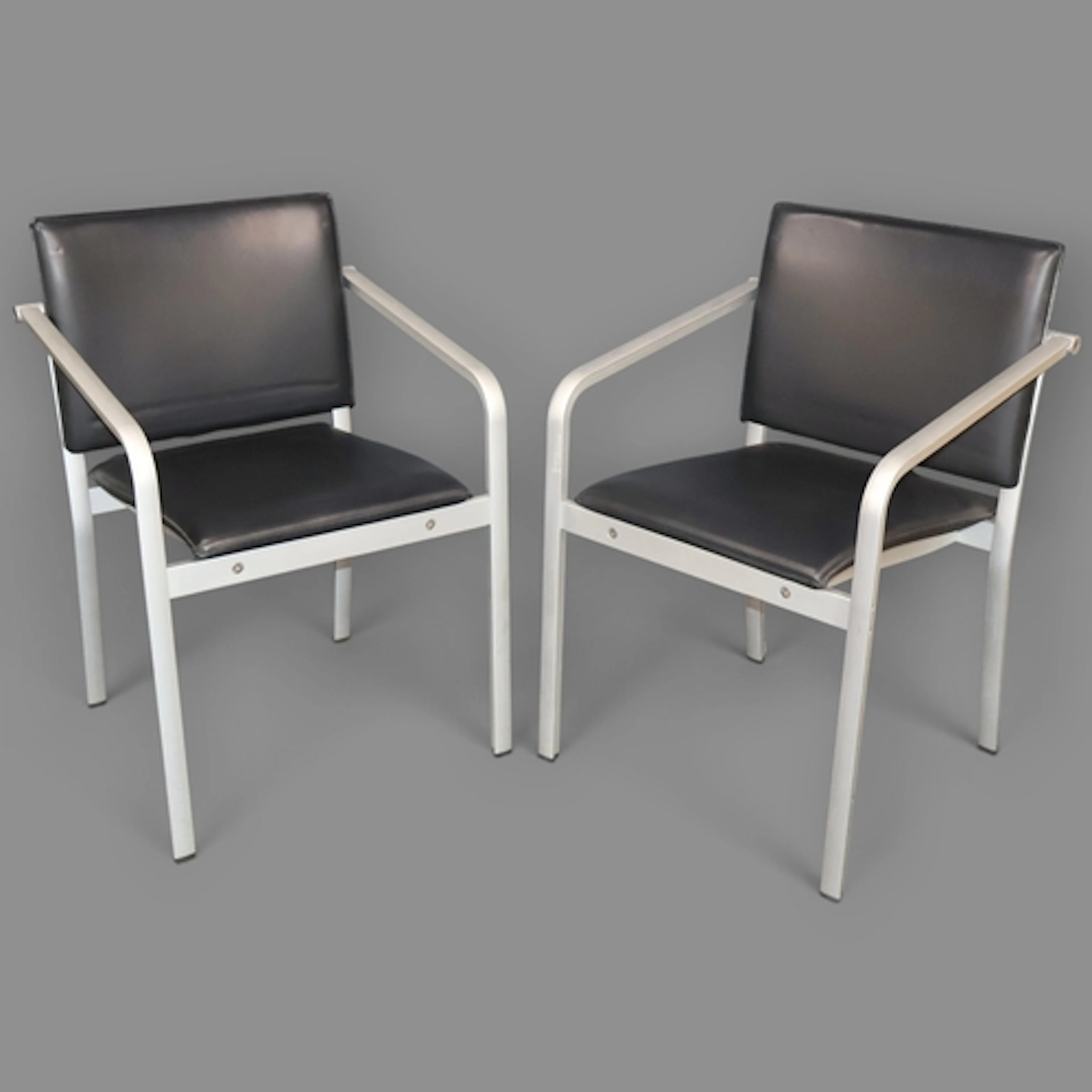 Sir Norman Foster, a pair of contemporary, designer armchair...