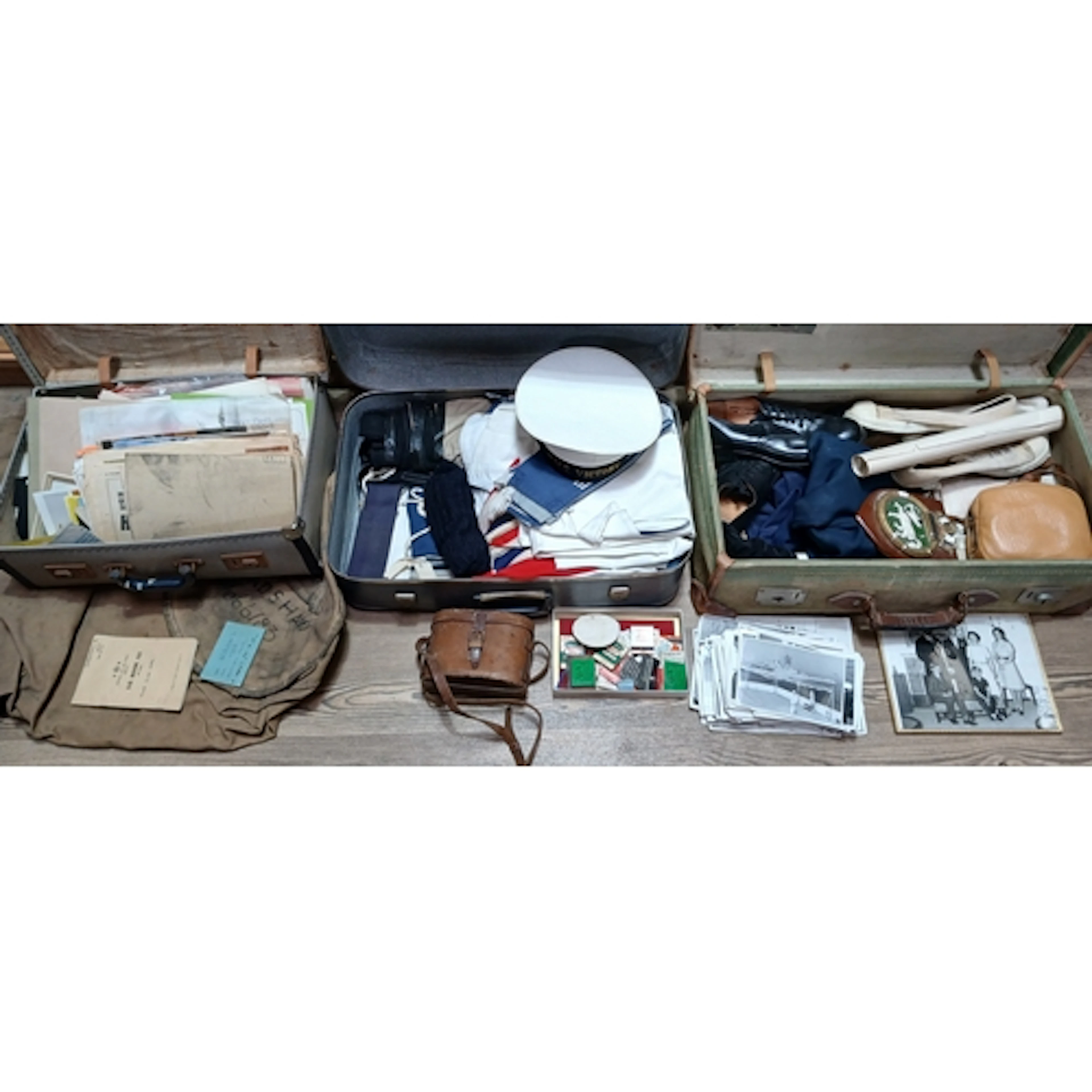 Three suit cases containing items relating to D Bradshaw Mar...