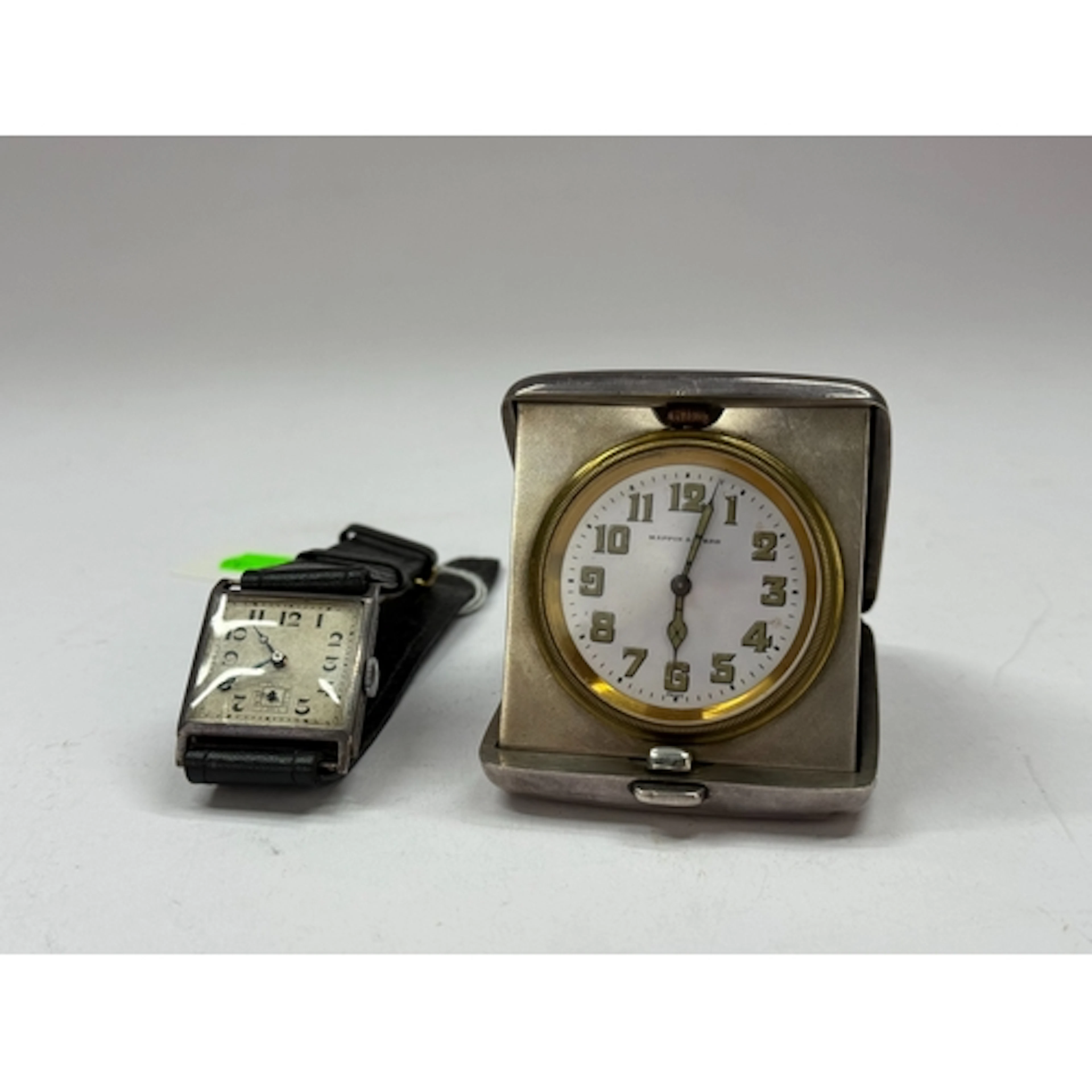 Watches: a silver Art Deco square cased wristwatch, import m...
