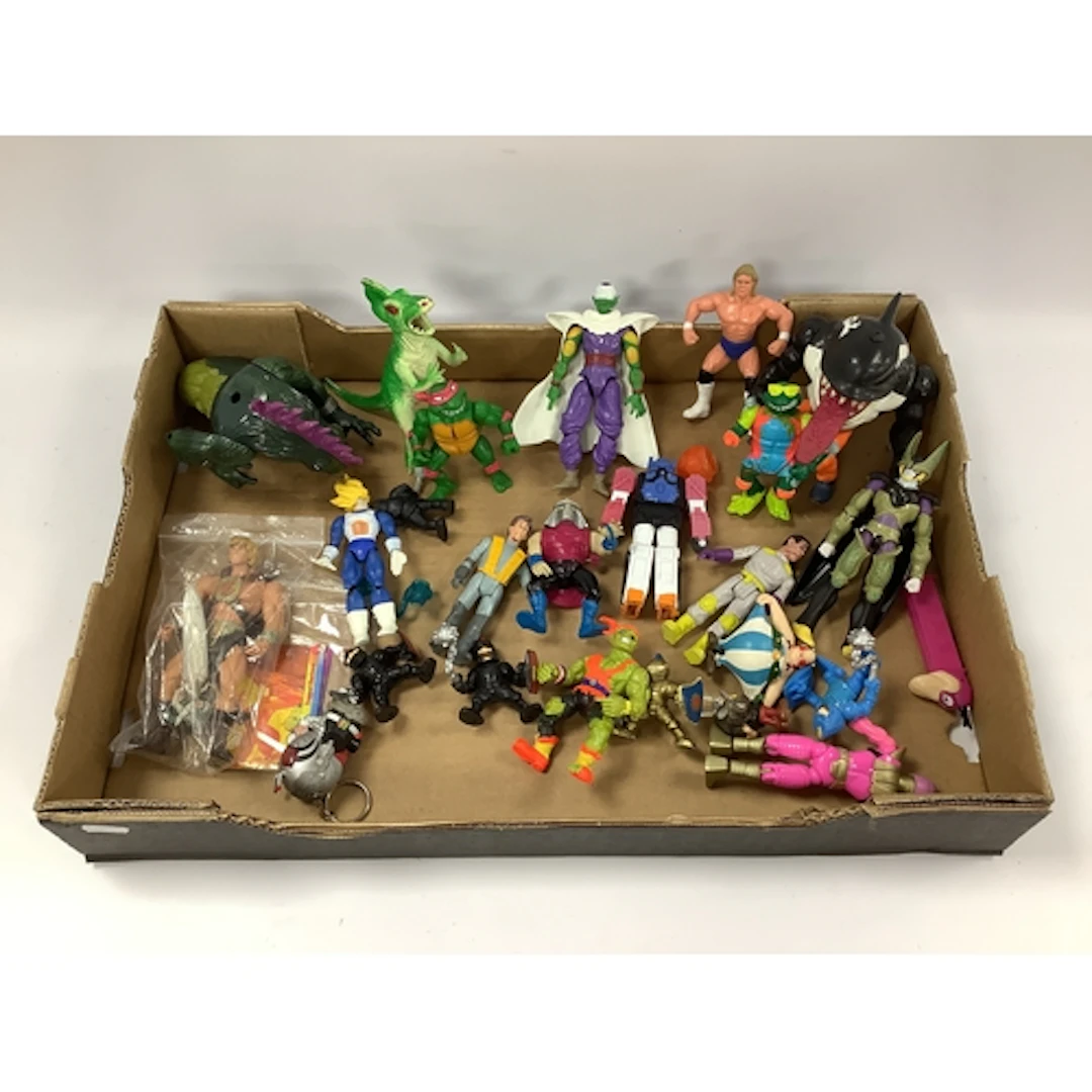 A quantity of plastic action figures. Themes include Ghostbu...