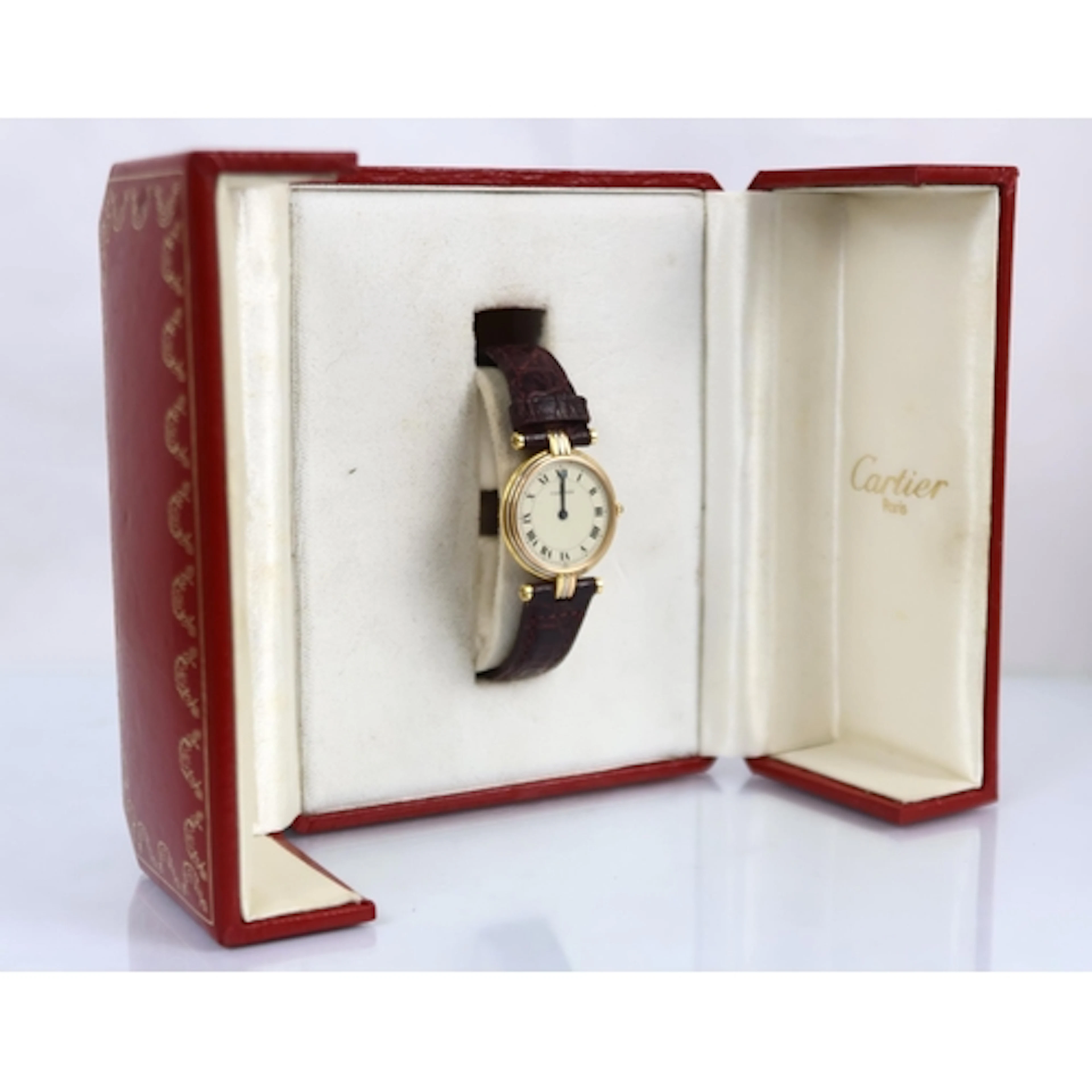 An 18ct three tone Cartier Vendome Trinity quartz wristwatch...