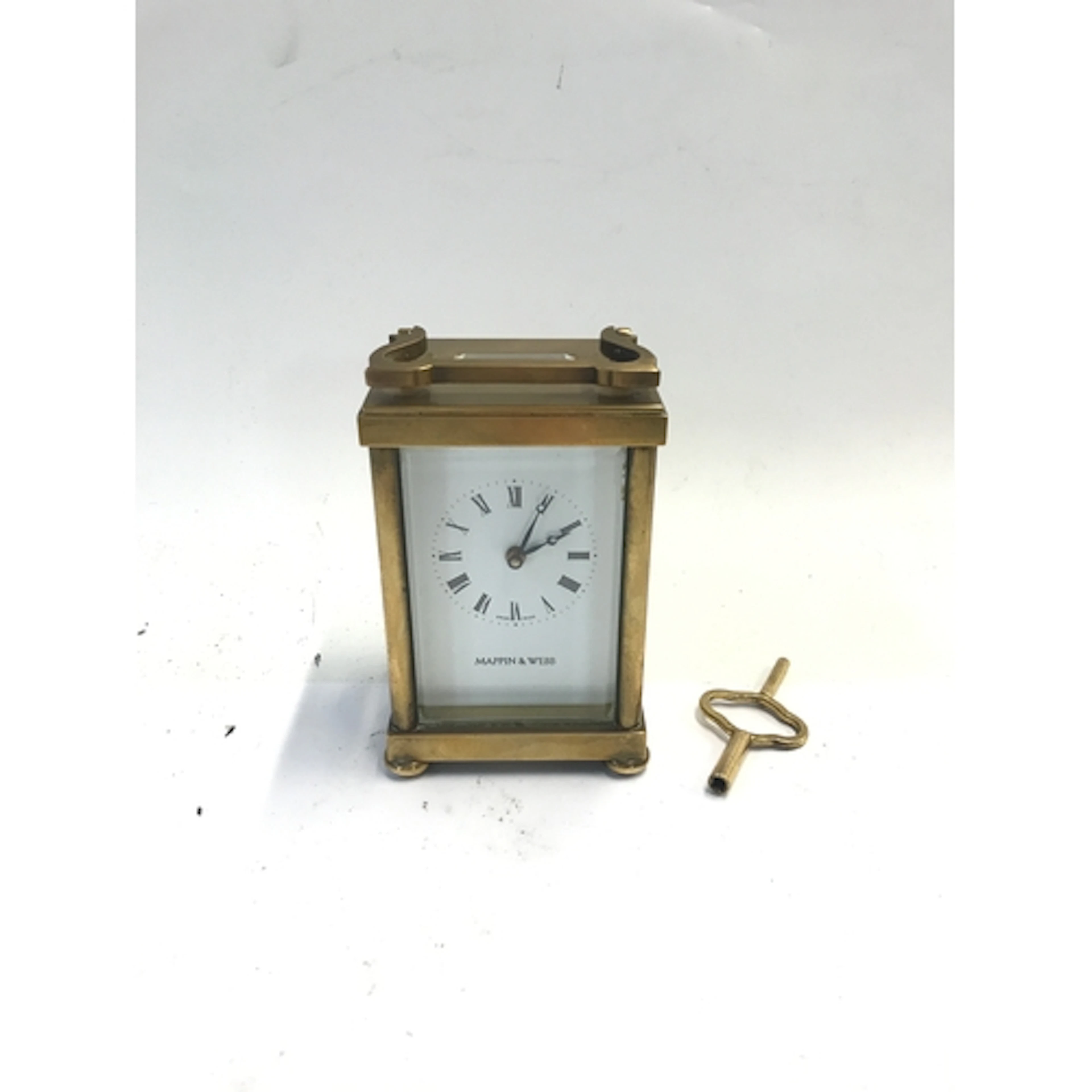 A Mappin and Webb gold plated carriage clock NO RESERVE