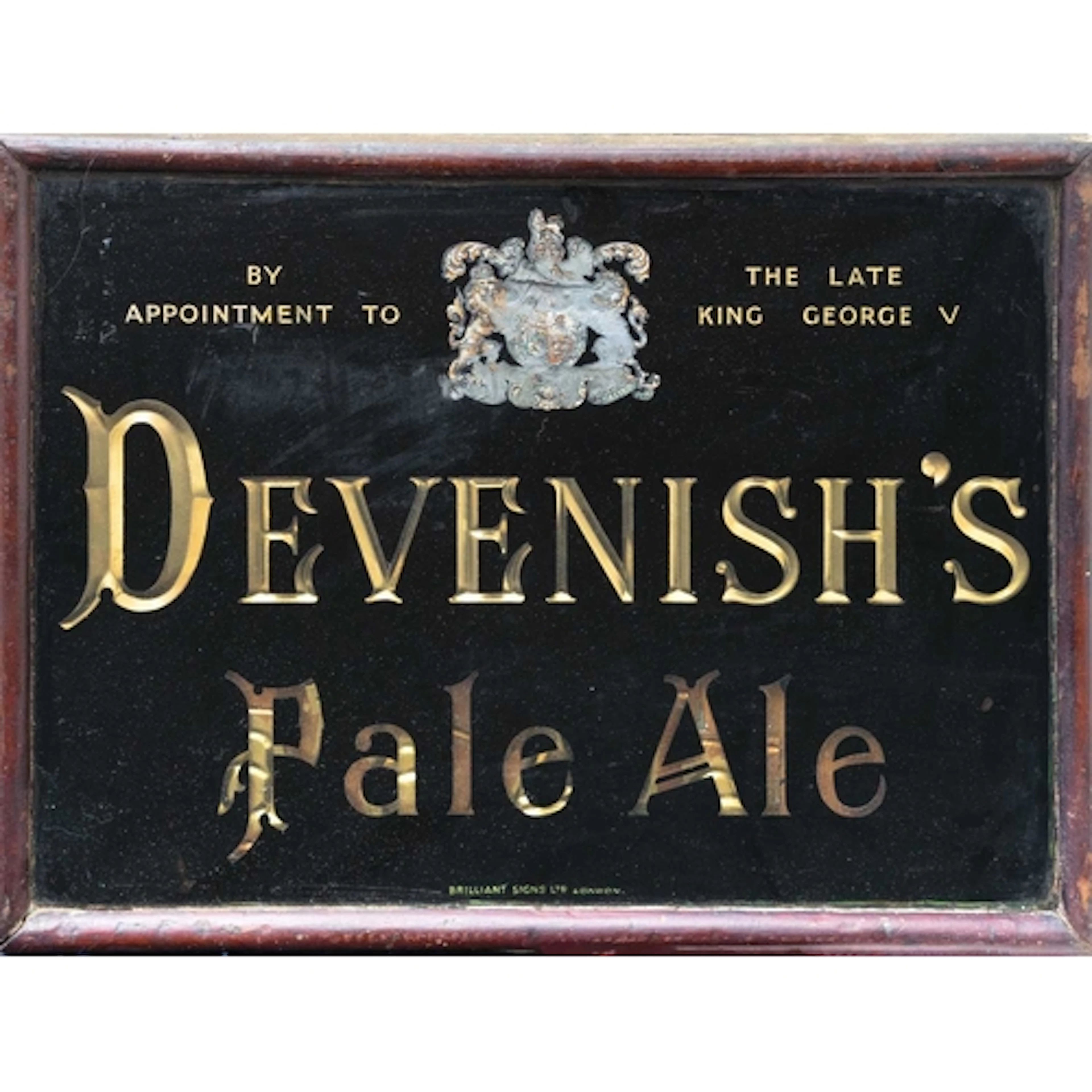 A public house glass advertising sign 'Devenish's Pale Ale'....