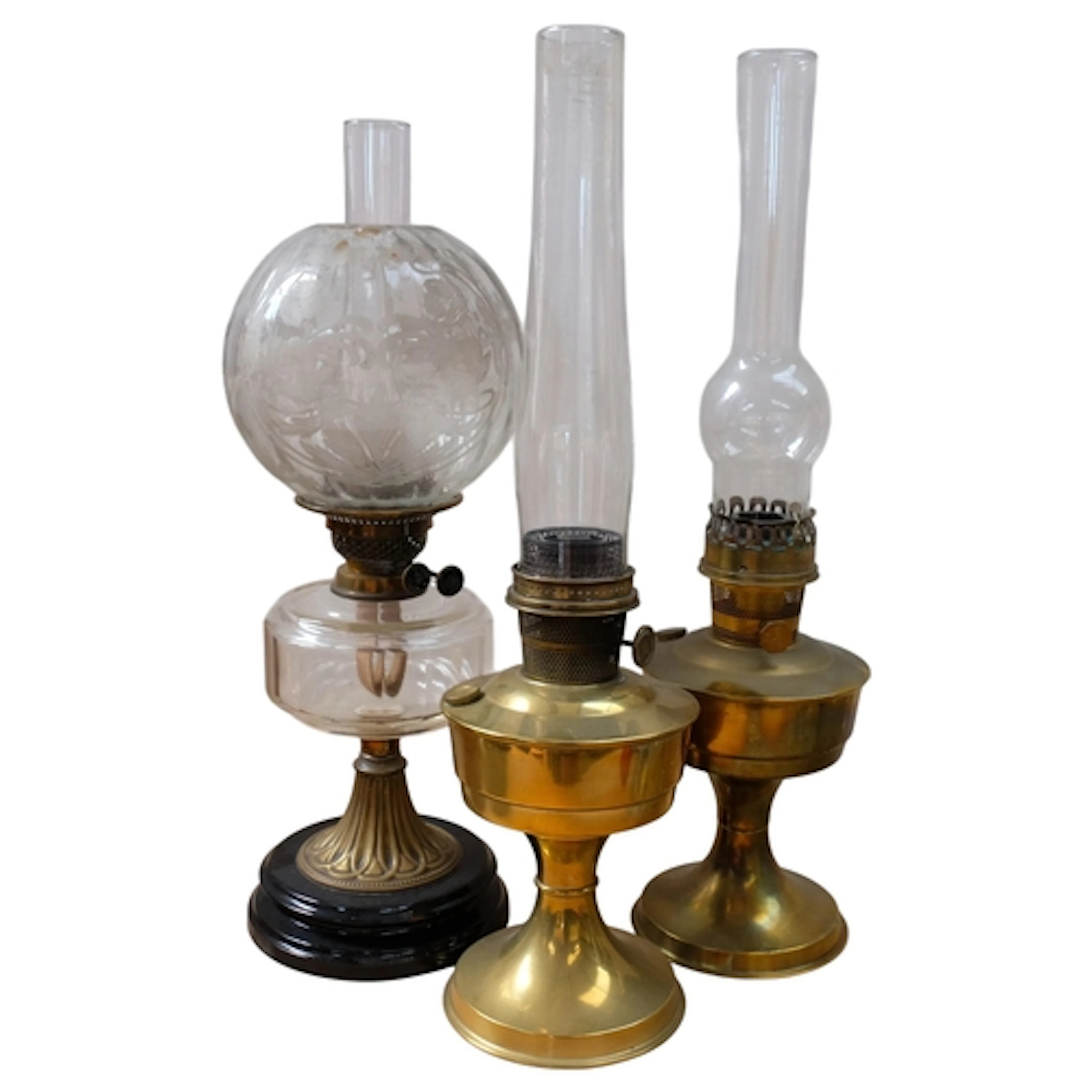 A Victorian brass oil lamp on black ceramic base, with facet...