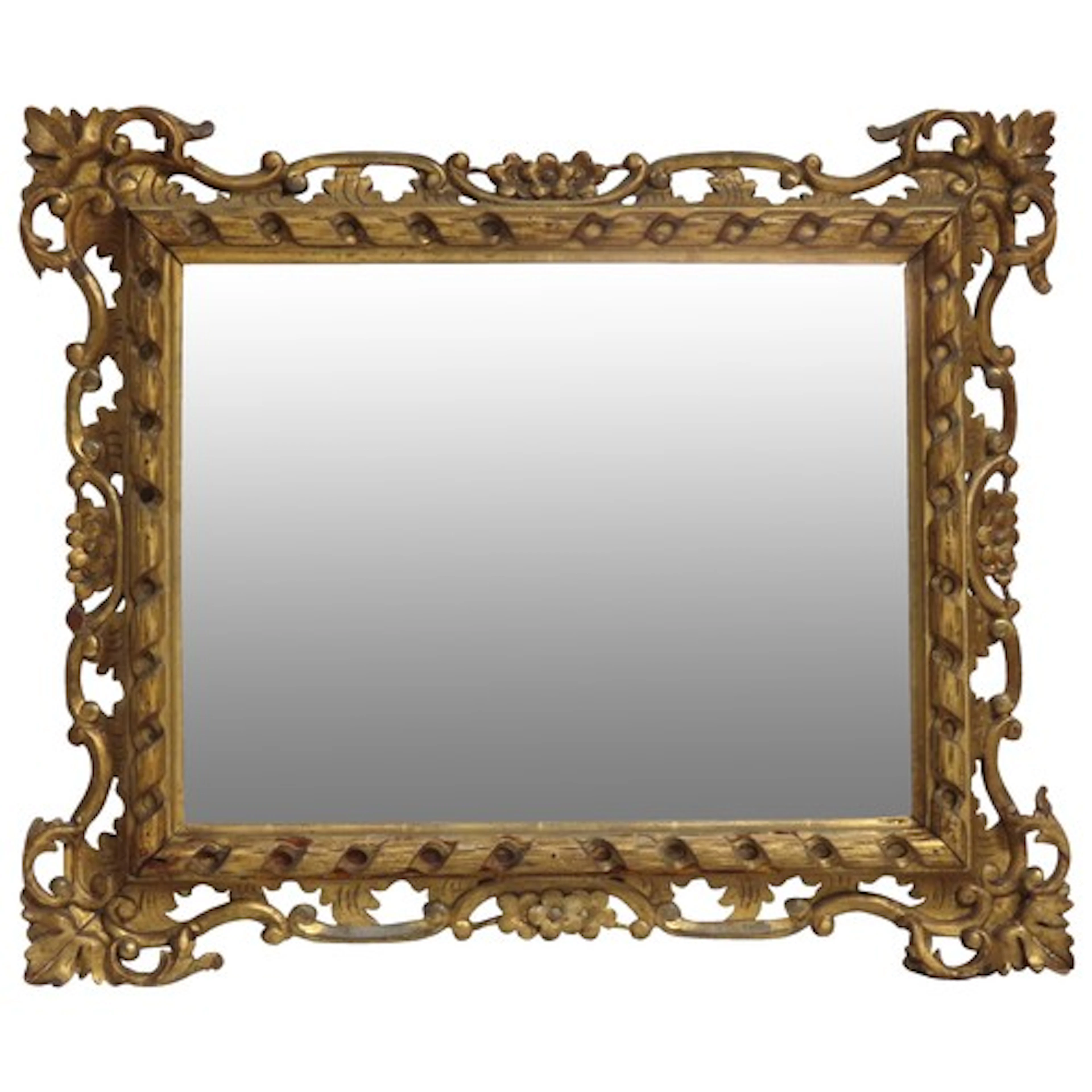 AN ORNATE FLORENTINE WALL MIRROR 54 x 63 cm Provenance: Fro...