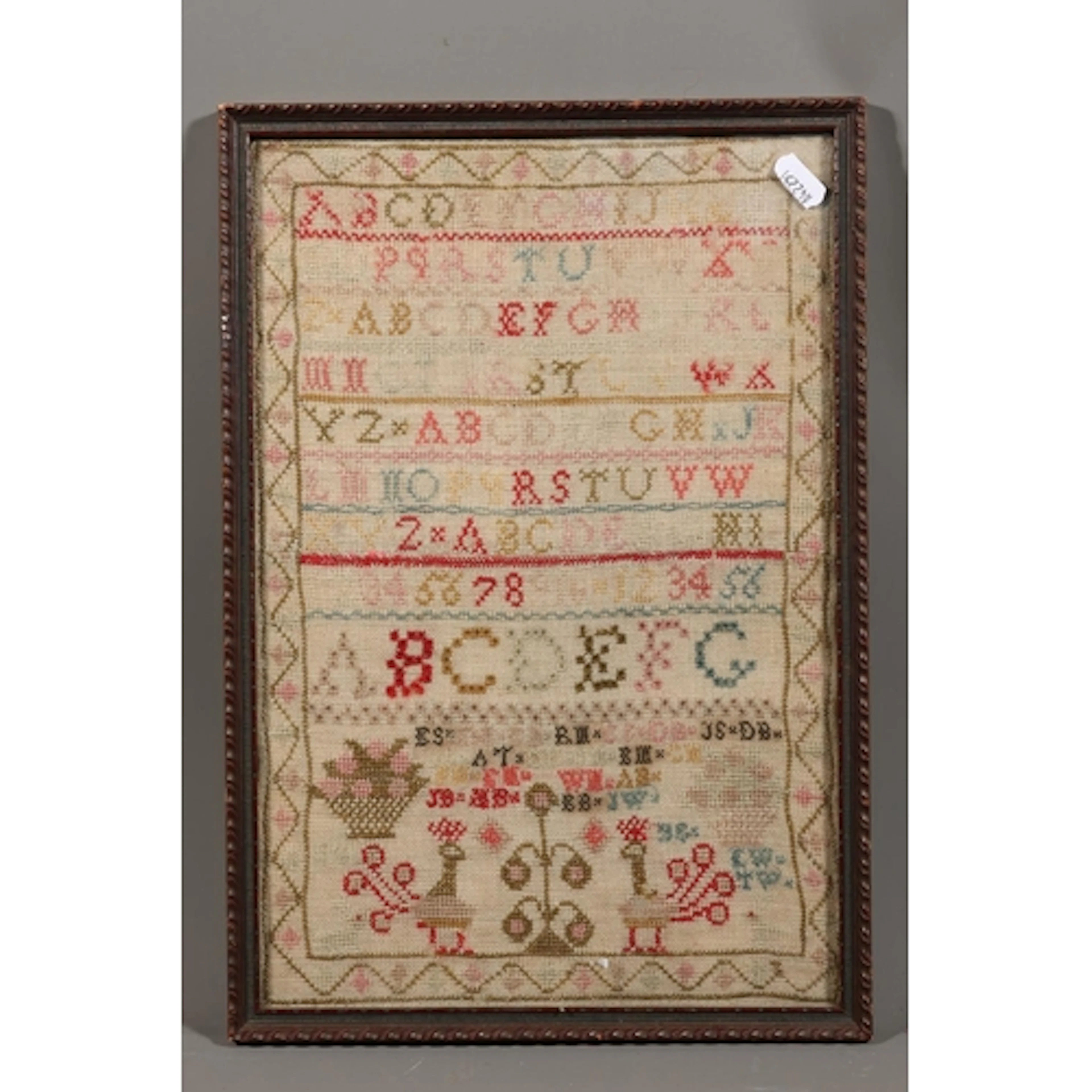 Antique needlework sampler, frame 40cm x 28cm.