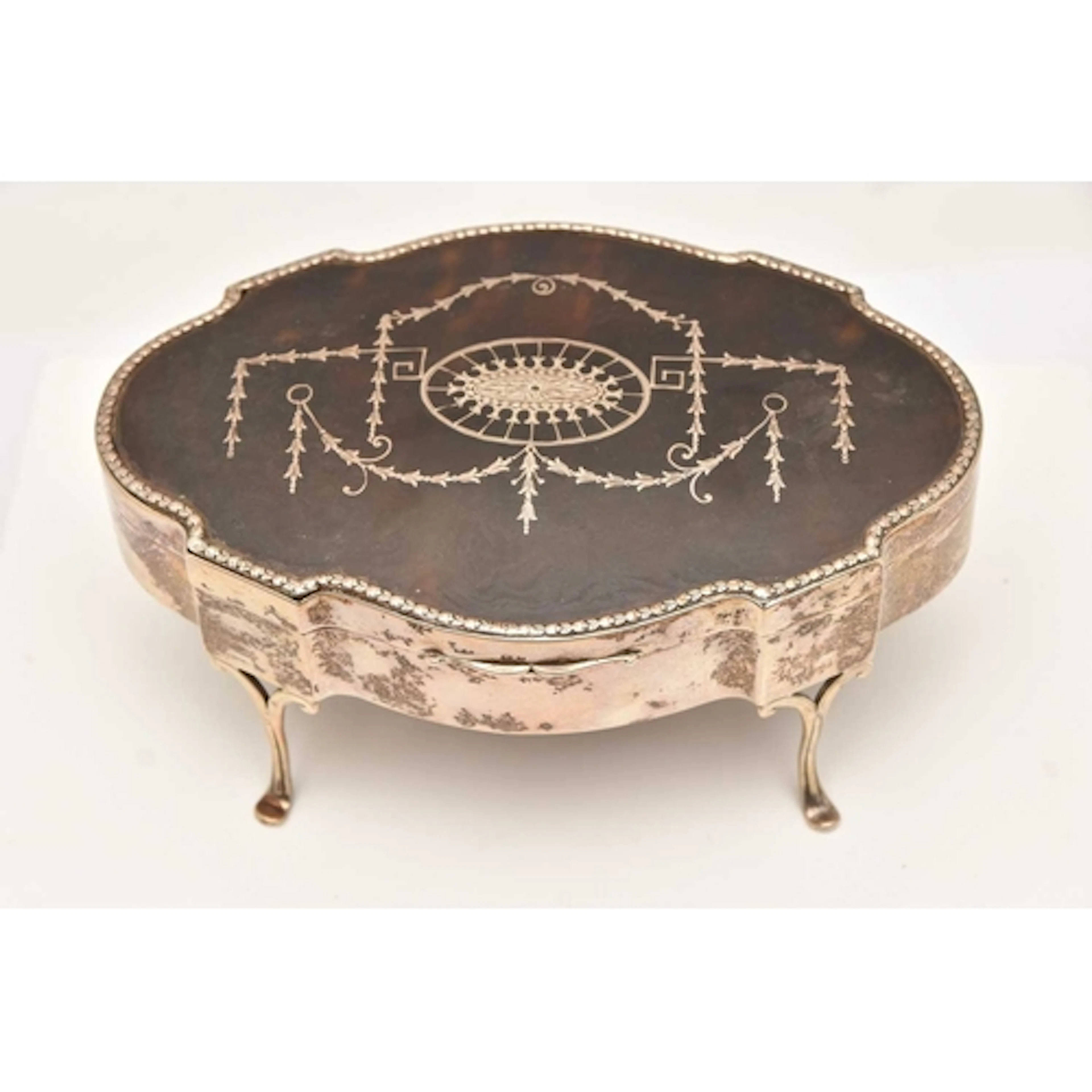 AN EARLY 20TH CENTURY SILVER AND PIQUE TORTOISESHELL JEWELLE...
