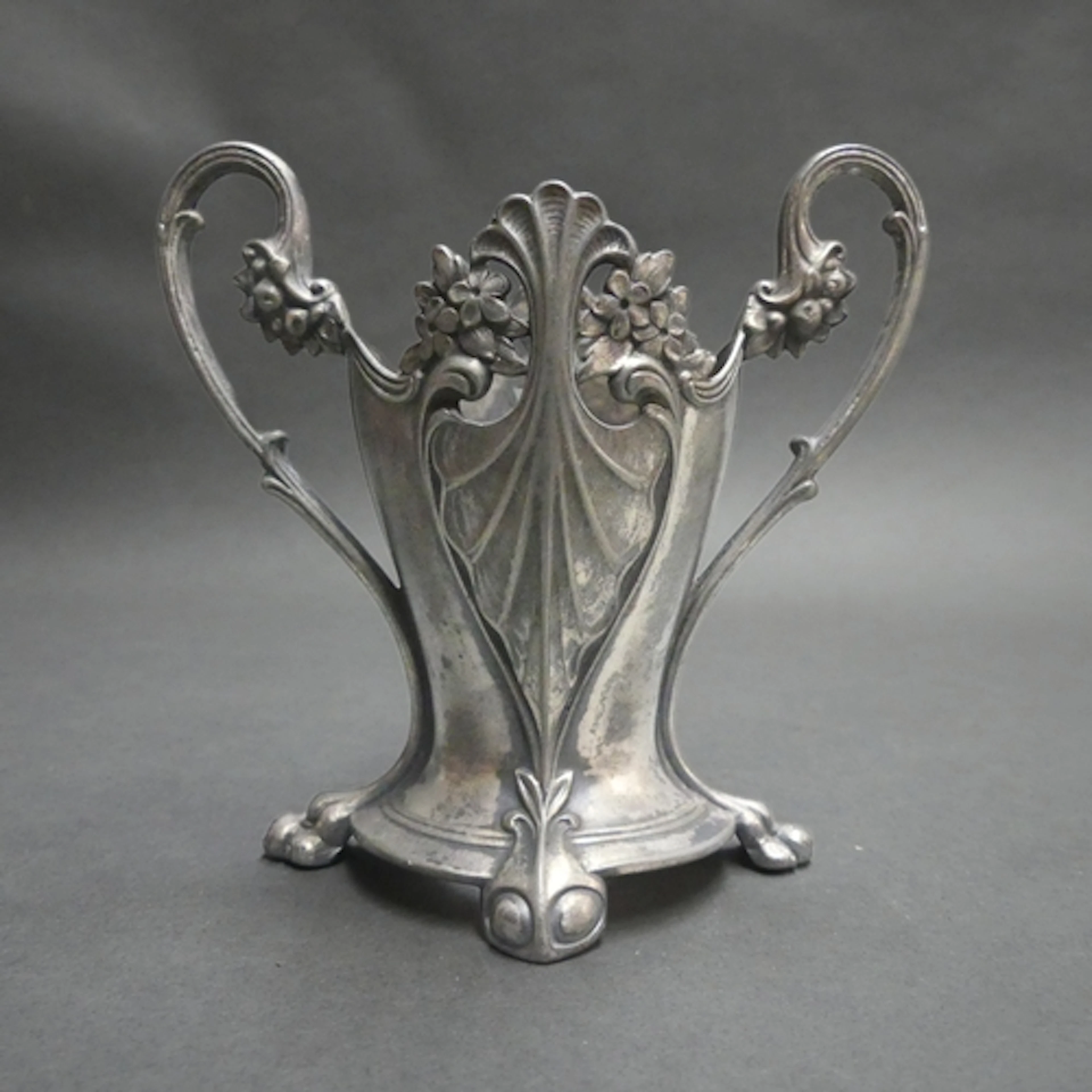 WMF - An Art Nouveau silver plated Brittania metal twin hand...