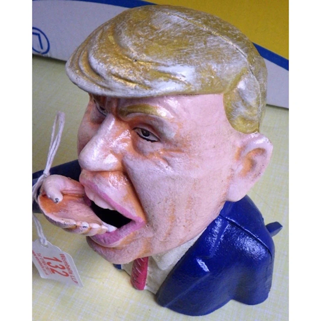A cast Trump money box