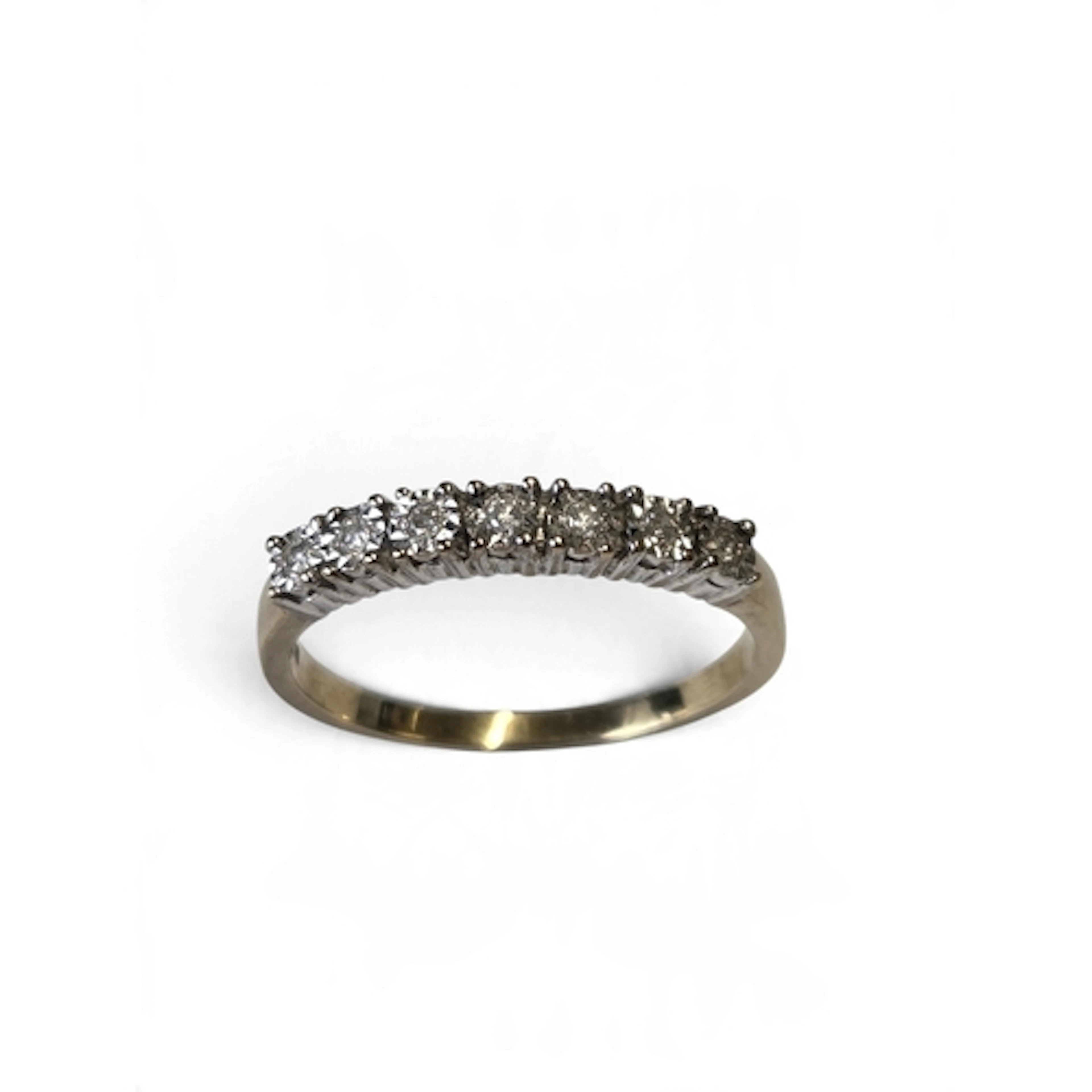 A vintage 9-carat gold seven-stone diamond half eternity rin...