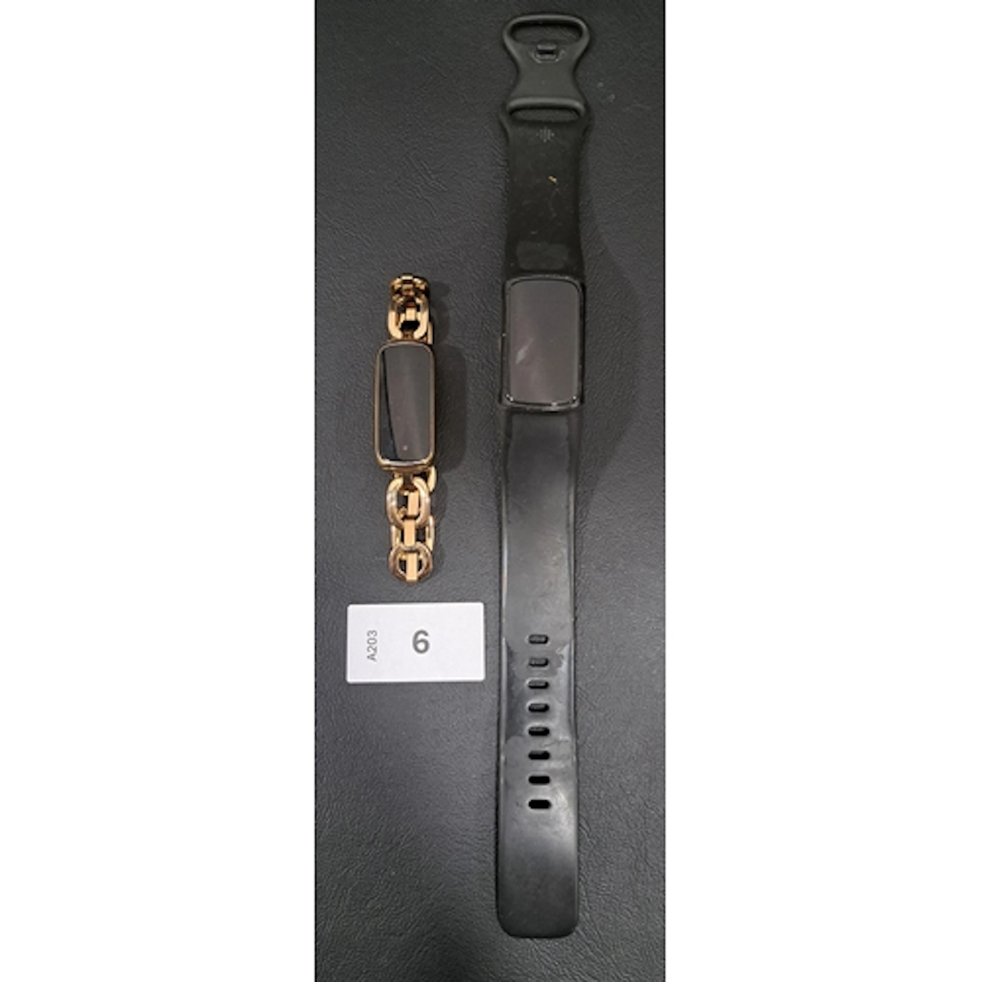 TWO FITBIT FITNESS TRACKERS COMPRISING LUXE SPECIAL EDITION ...