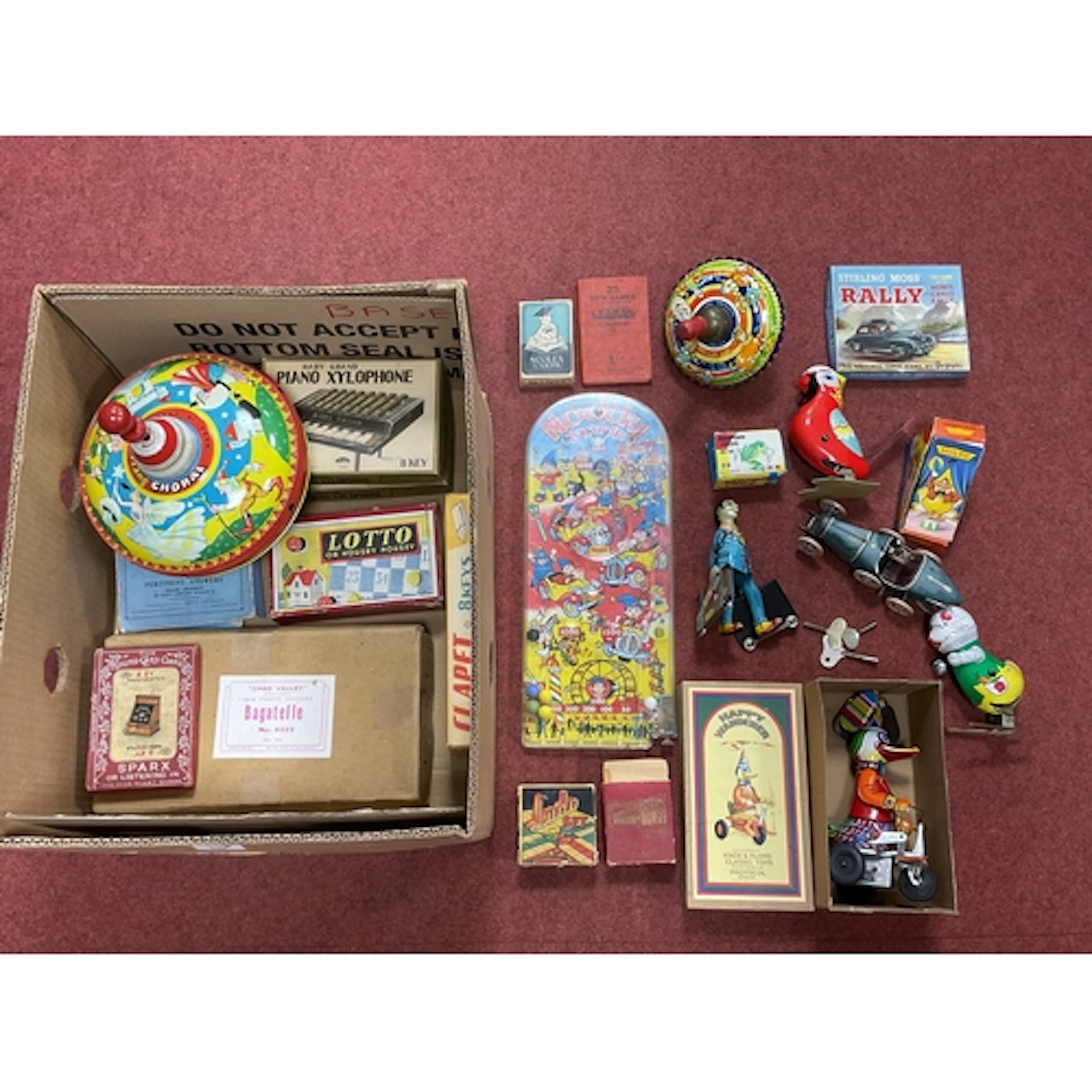 A Quantity of Mid XX Century and Later Tinplate Toys and Gam...