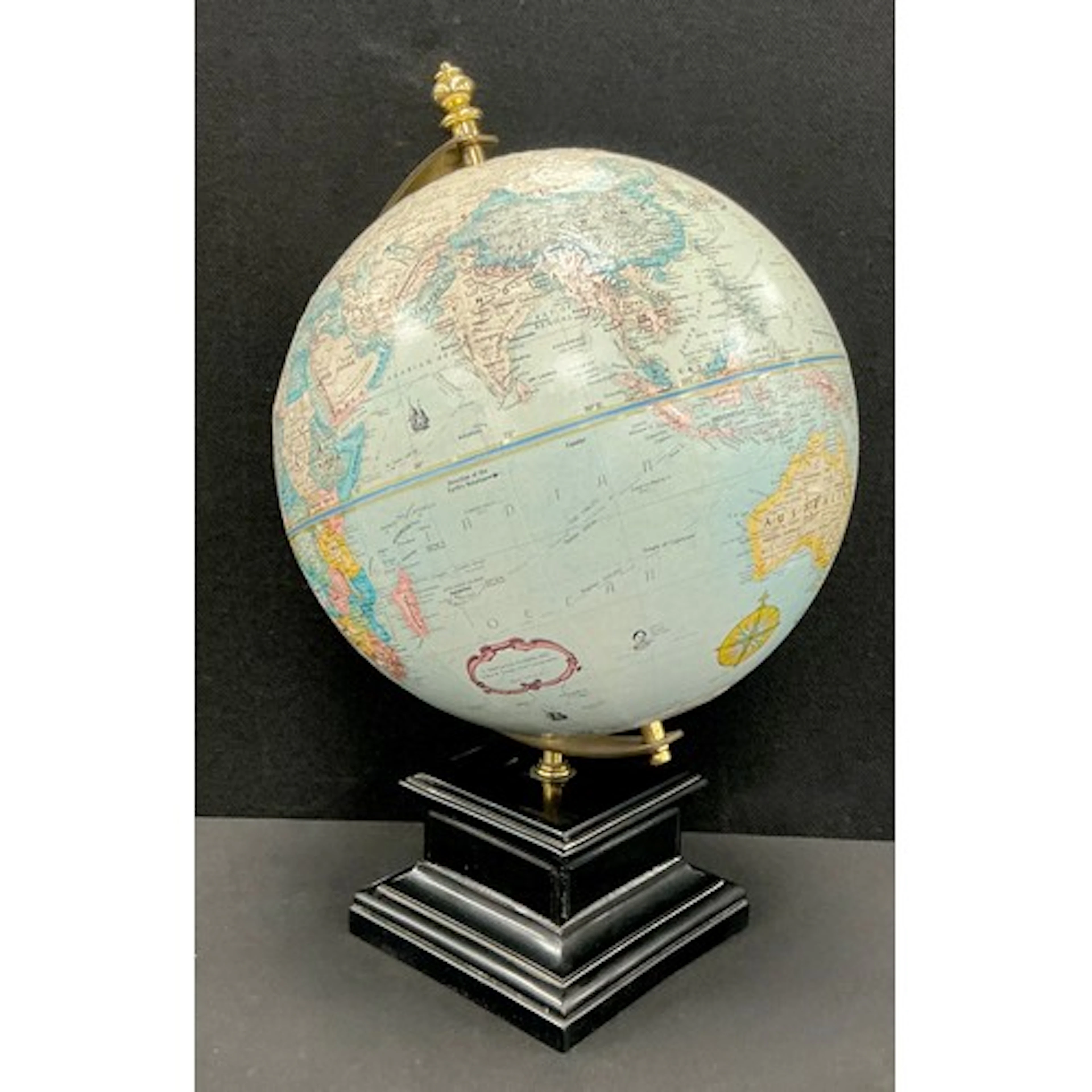 A Replogle 12 inch world classic series globe, brass mounts,...