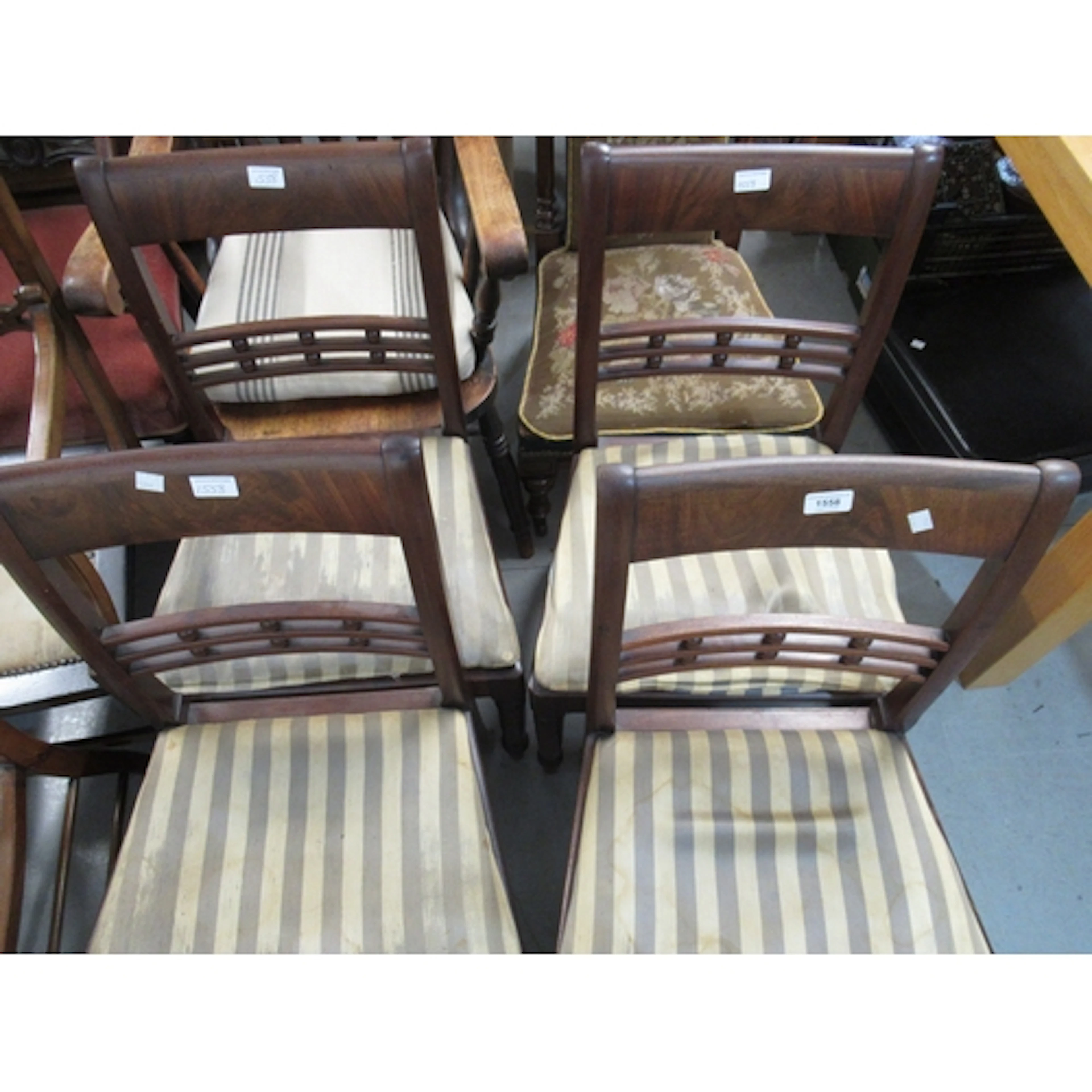 Set of four Regency mahogany railback side chairs, on turned...
