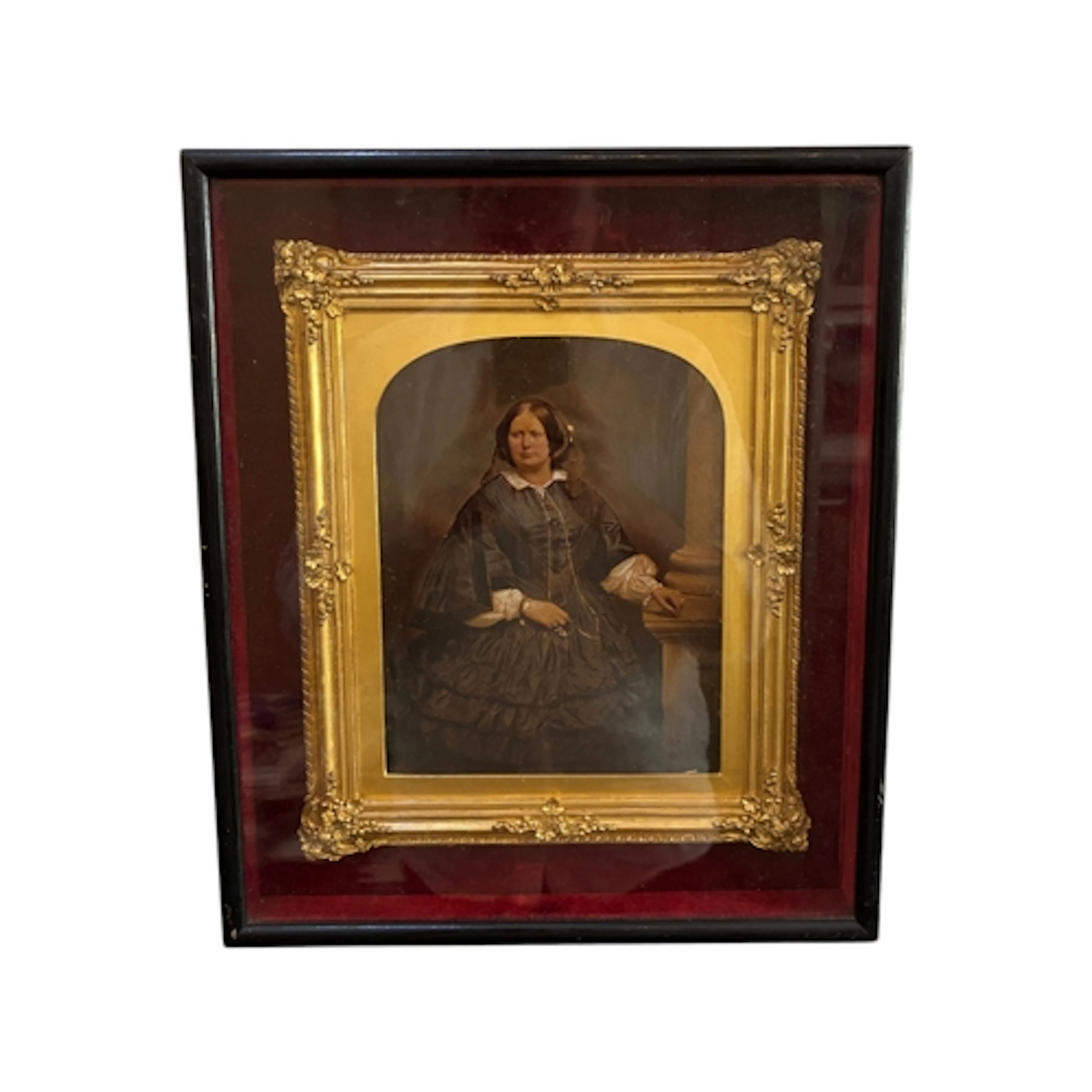 A 19th century photogravure portrait of a lady, with hand-pa...