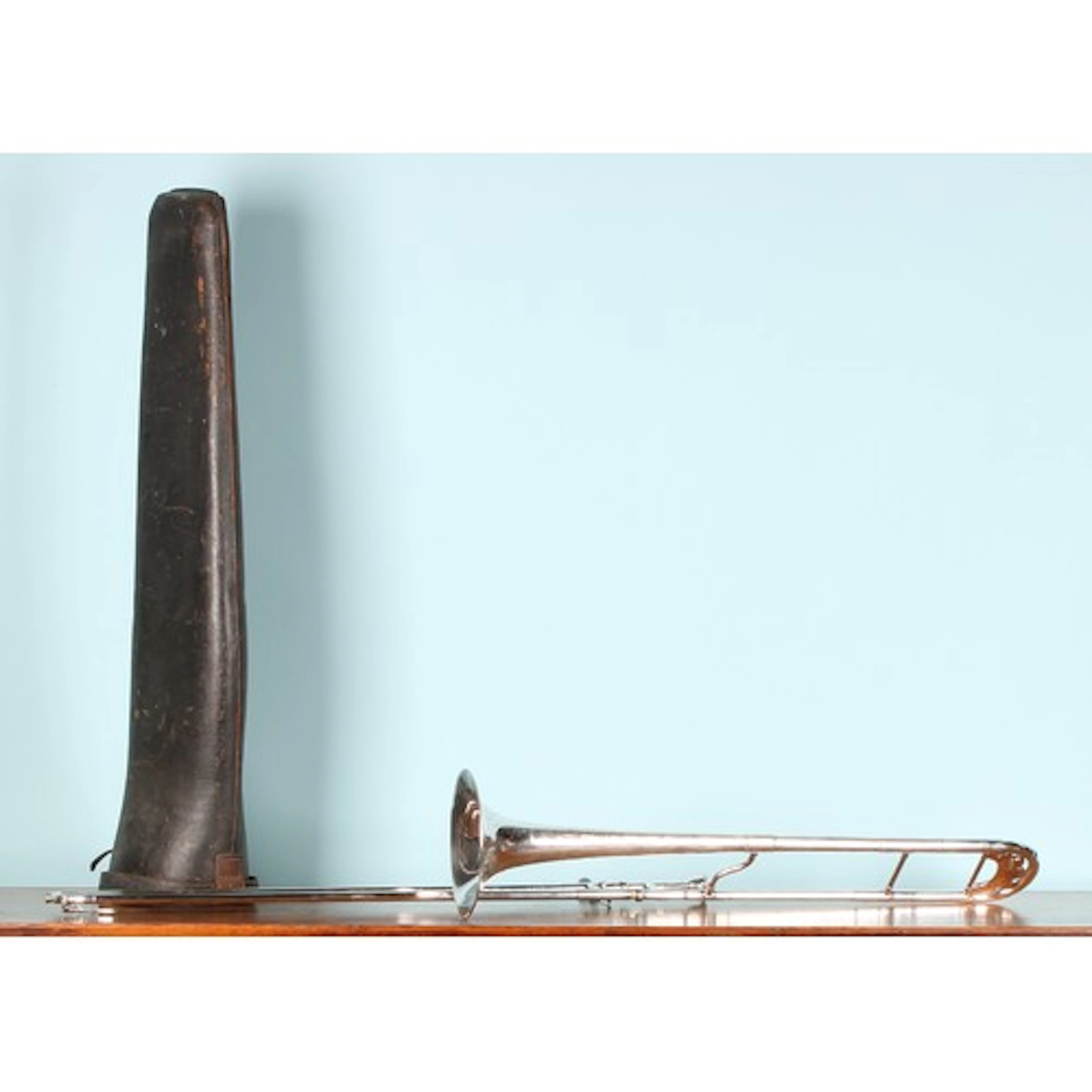 An early 20th century silver plated trombone, signed F Besso...