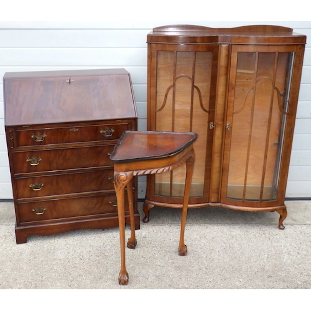 A reproduction mahogany bureau, corner table and a China cab...