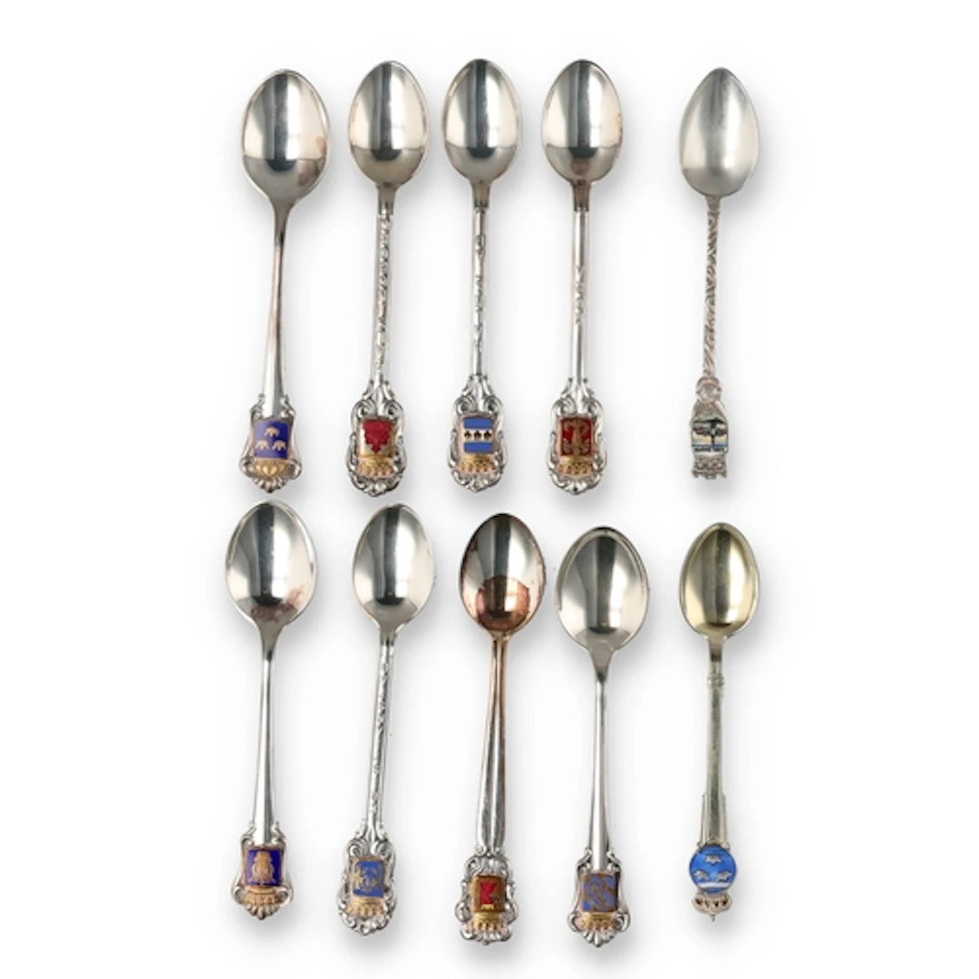 EIGHT SWEDISH SILVER AND COLOURED ENAMEL SOUVENIR SPOONS, W...