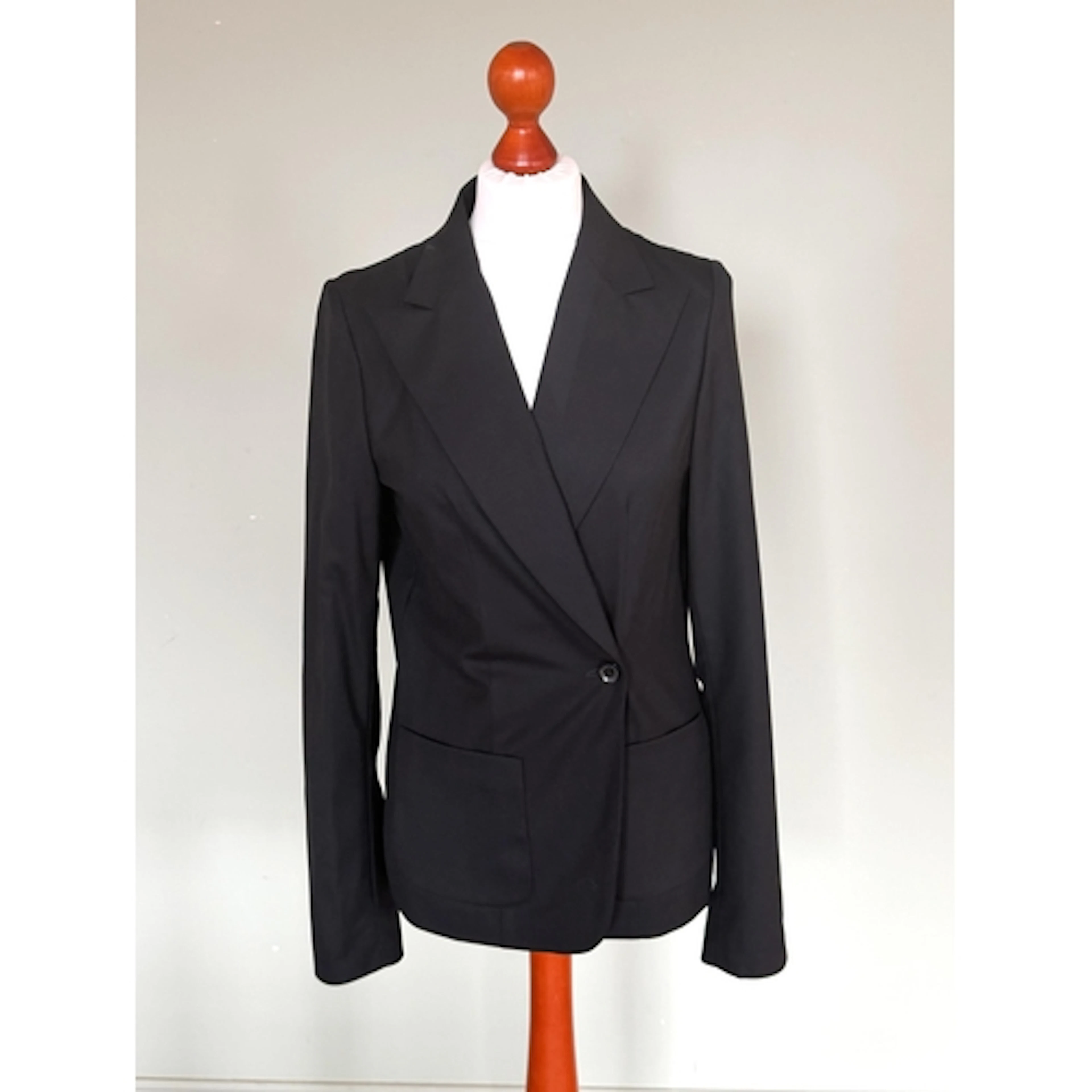A selection of ladies designer clothing, to include; a Gucci...