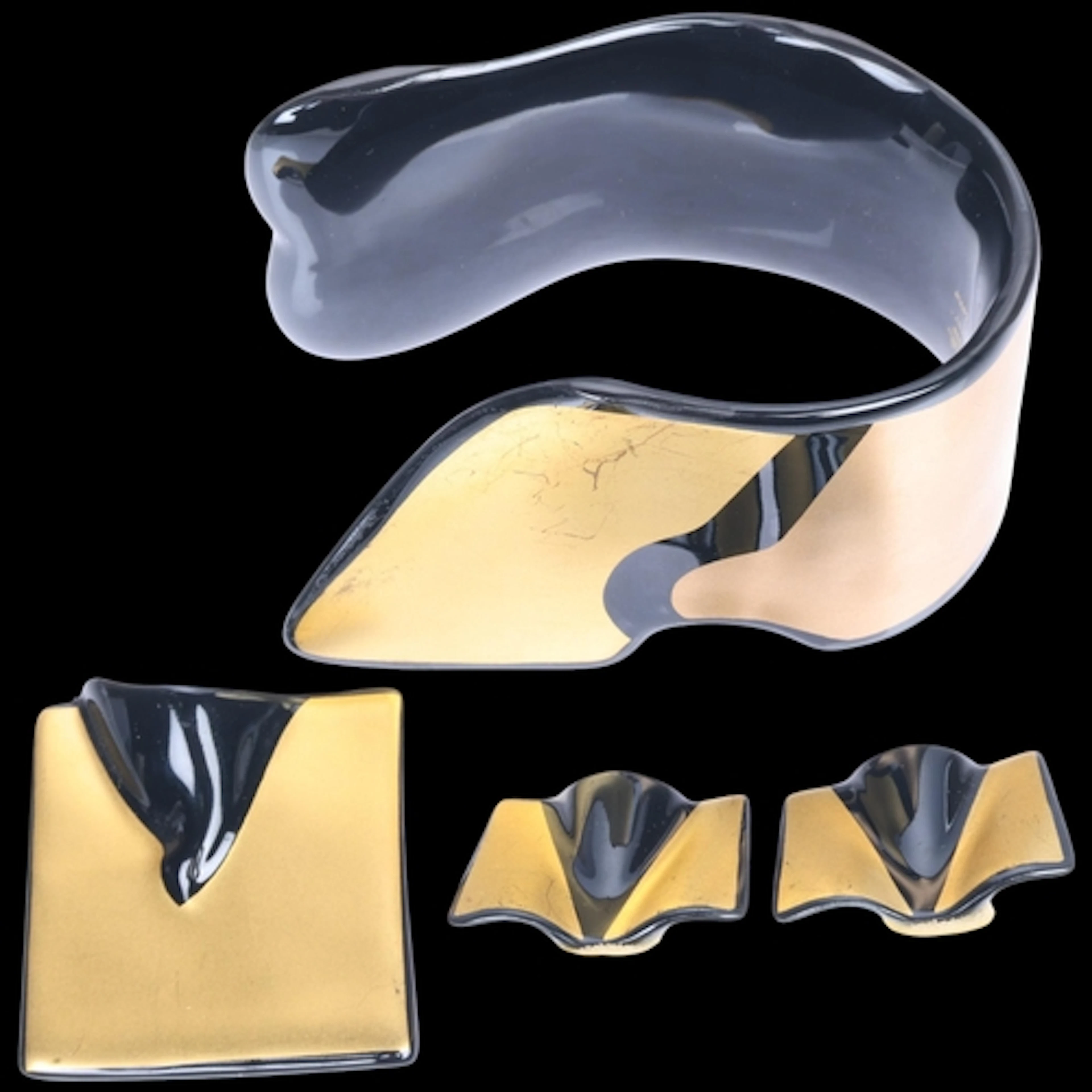 ROSENTHAL - a German gilded black porcelain Studio-Linie jew...