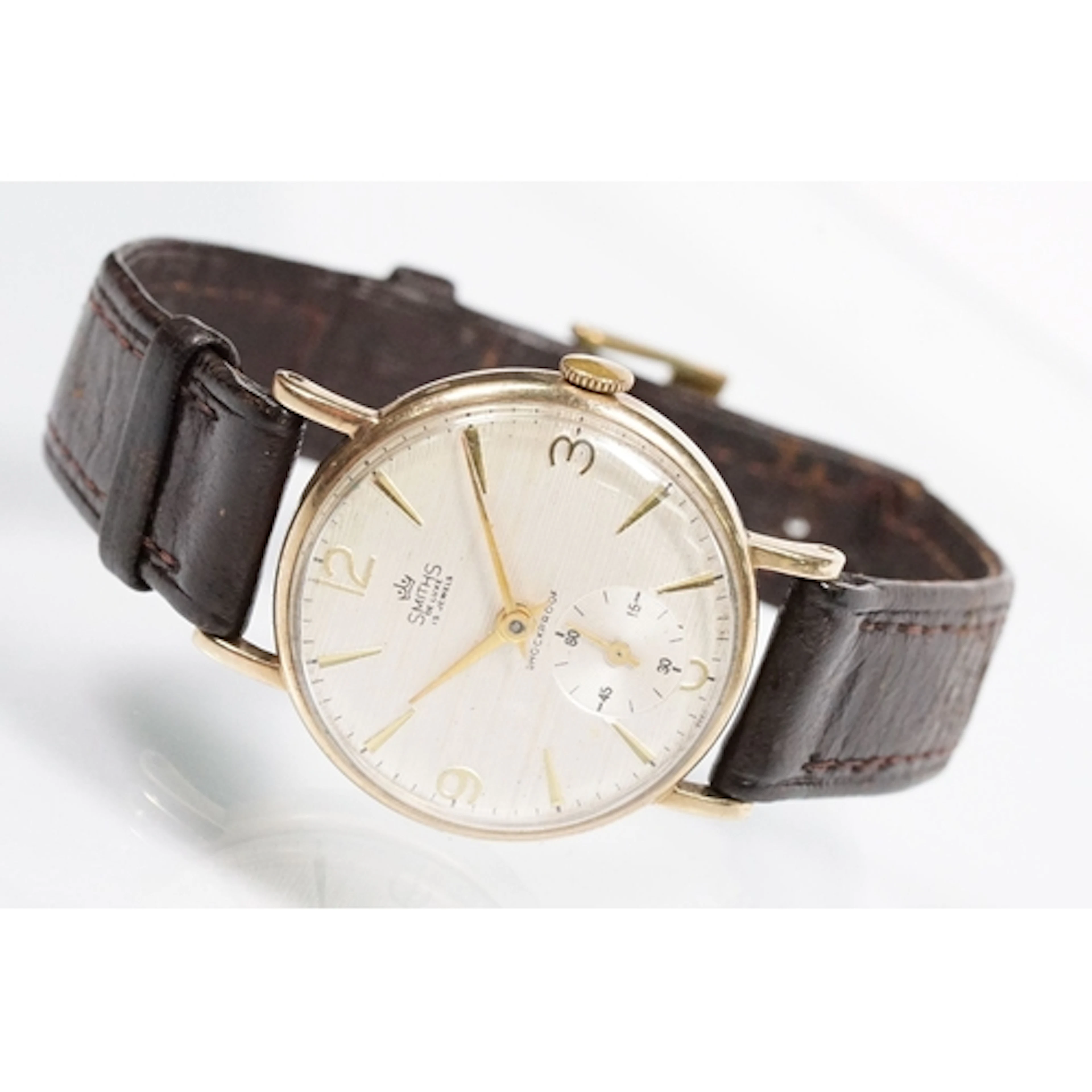 A gents mid 20th century Smith's De Luxe 15 Jewel shock proo...