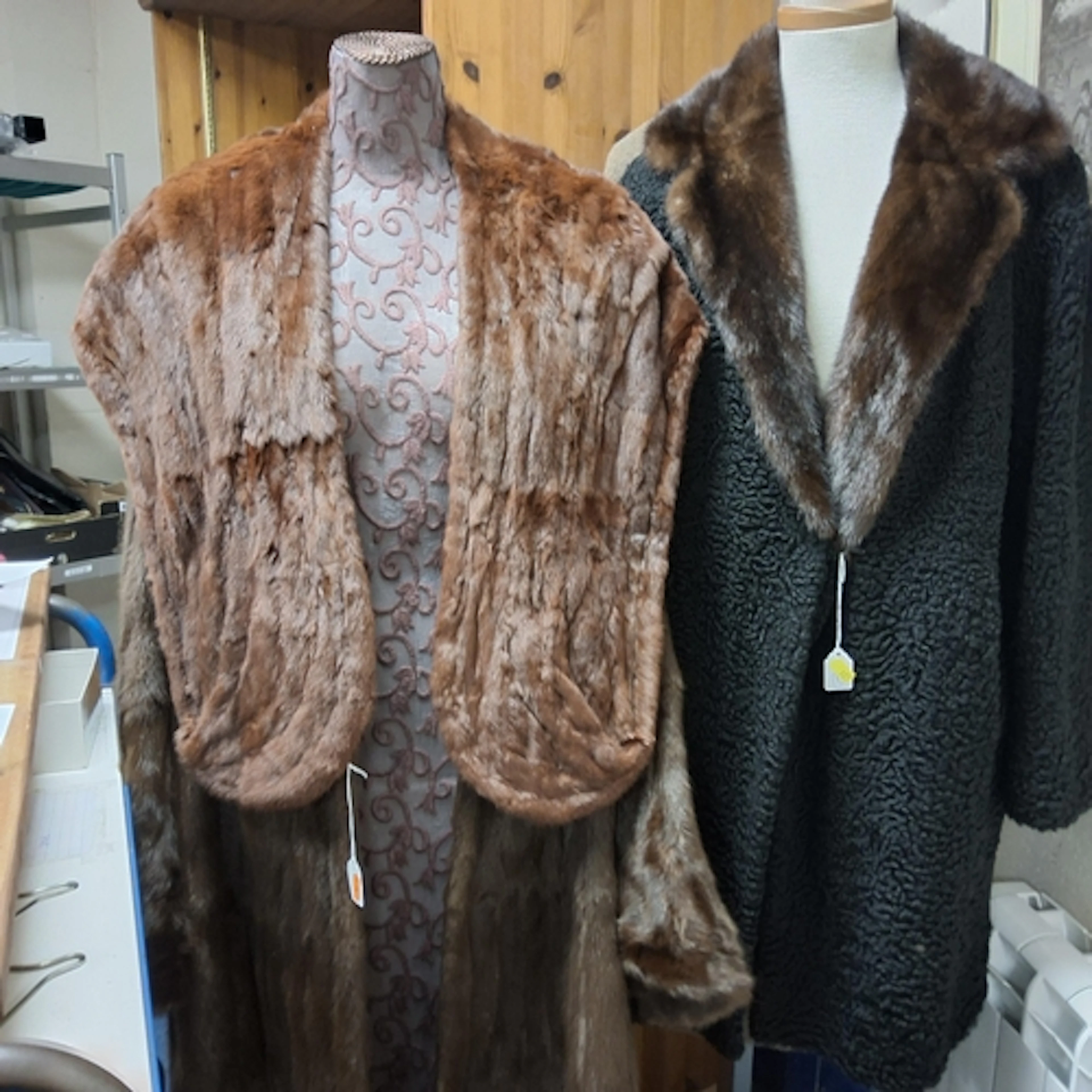 THREE VINTAGE COATS AND A STOLE, to include a black curly la...