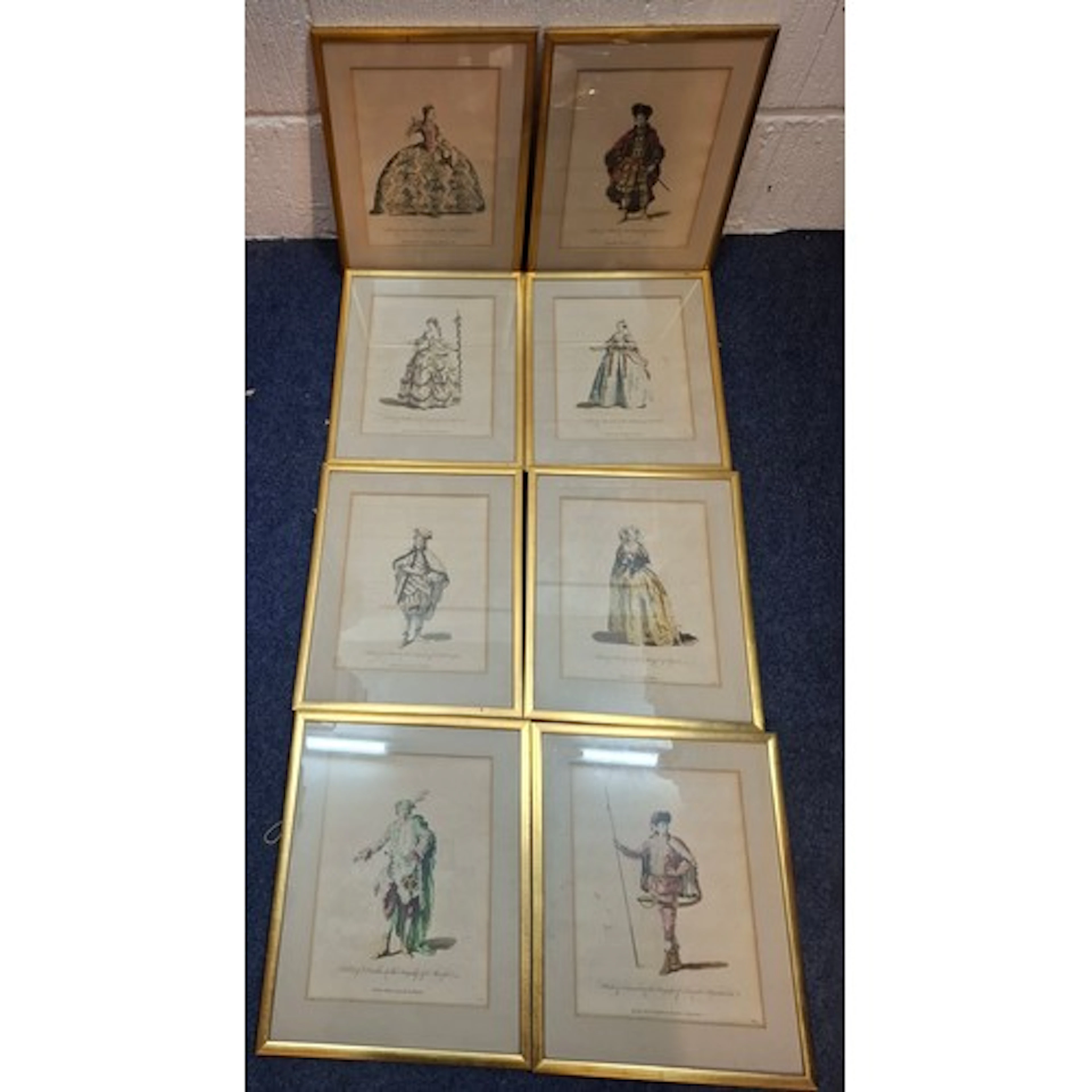 A set of 8 antiquarian engravings of theatrical costumes thr...