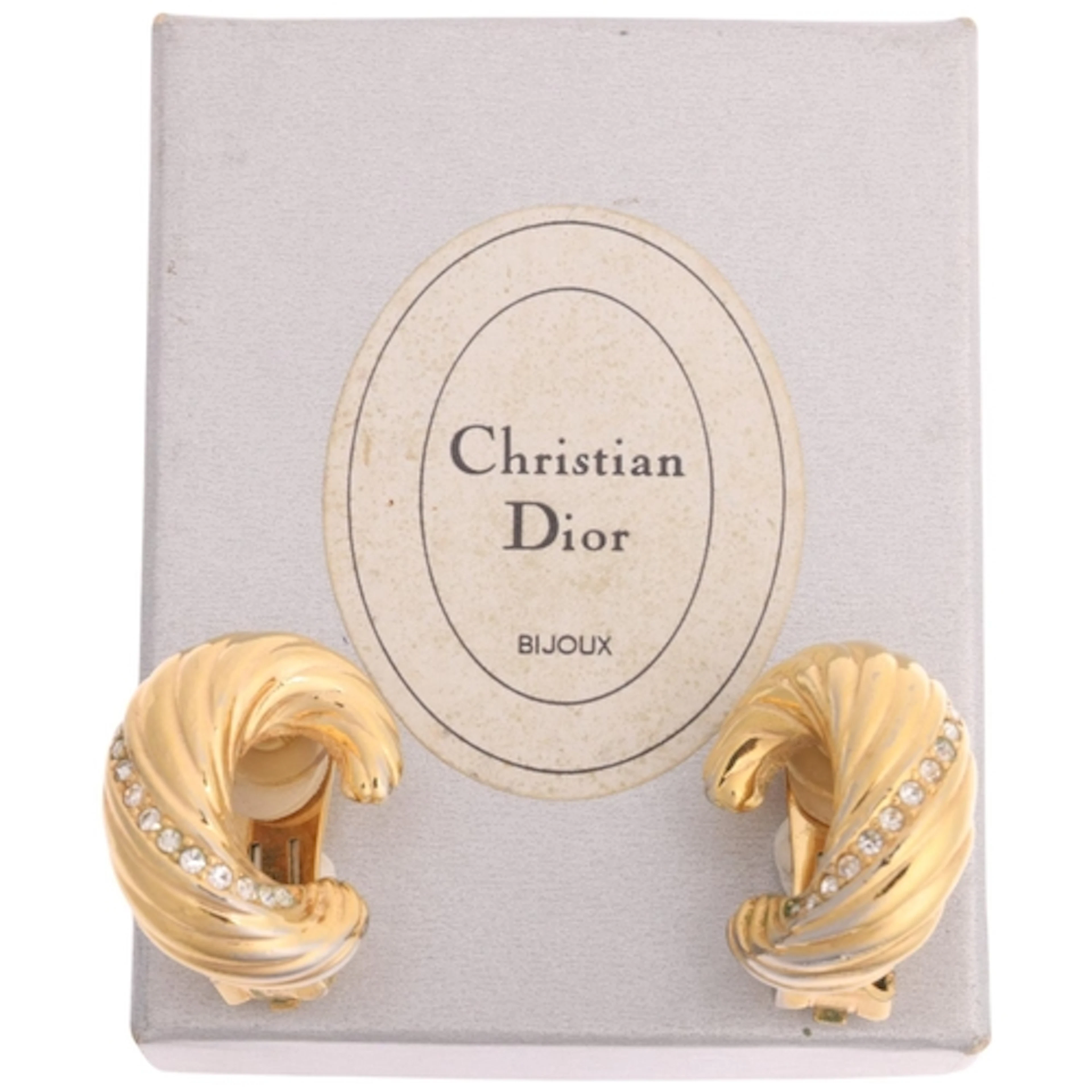 CHRISTIAN DIOR - a pair of Vintage gilt-metal rhinestone cli...