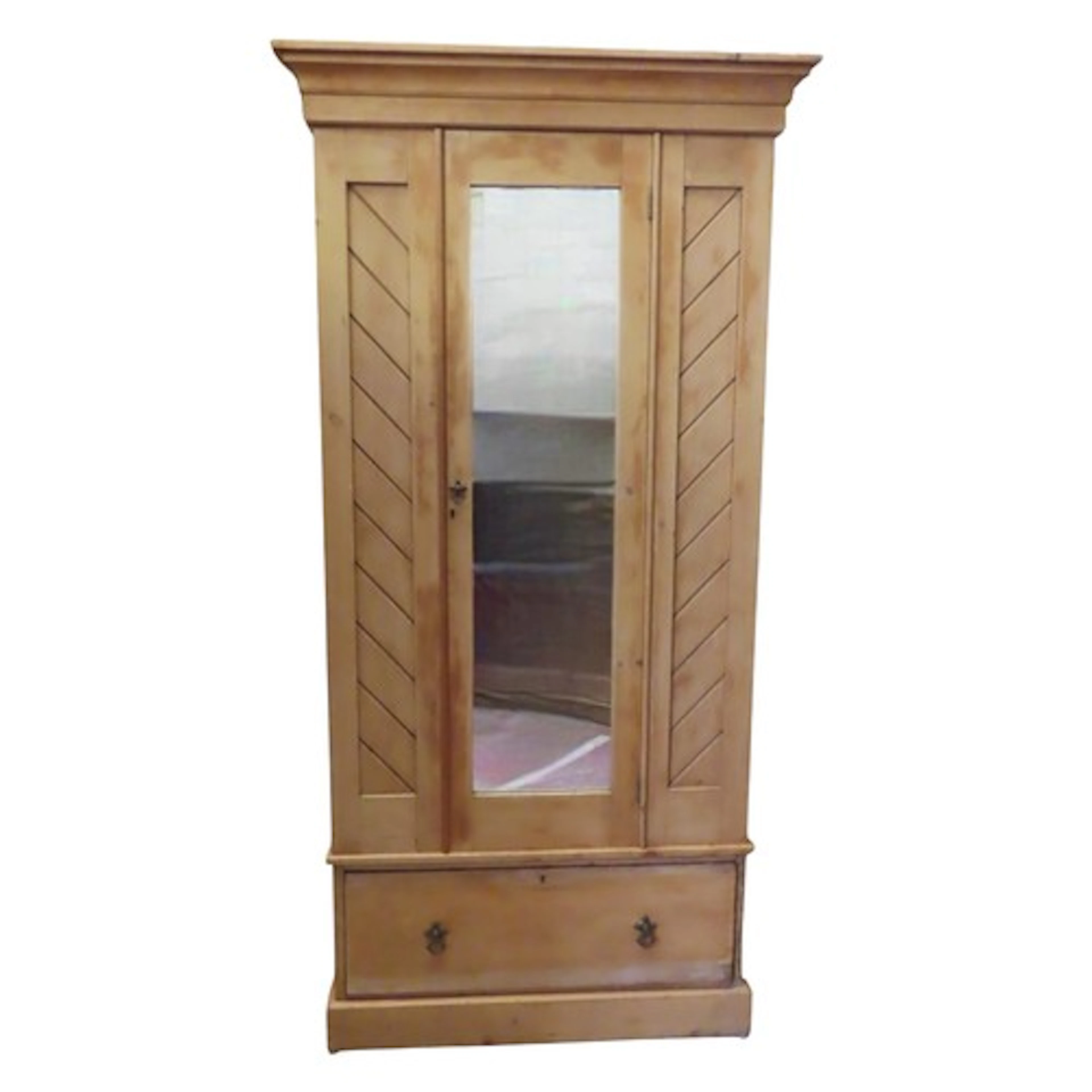 A Victorian stripped pine single wardrobe with gothic influe...