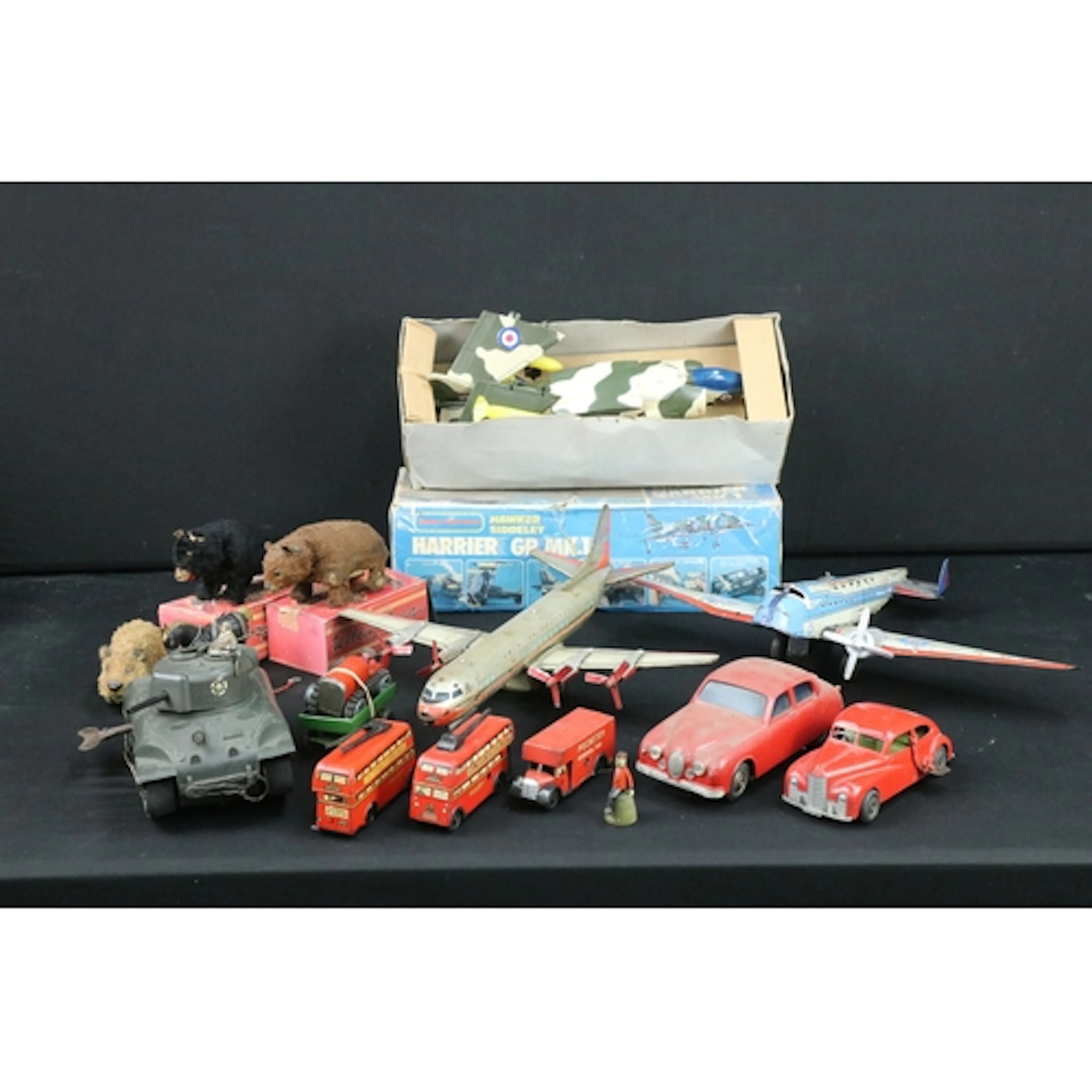 13 Tinplate and plastic clockwork and friction powered model...