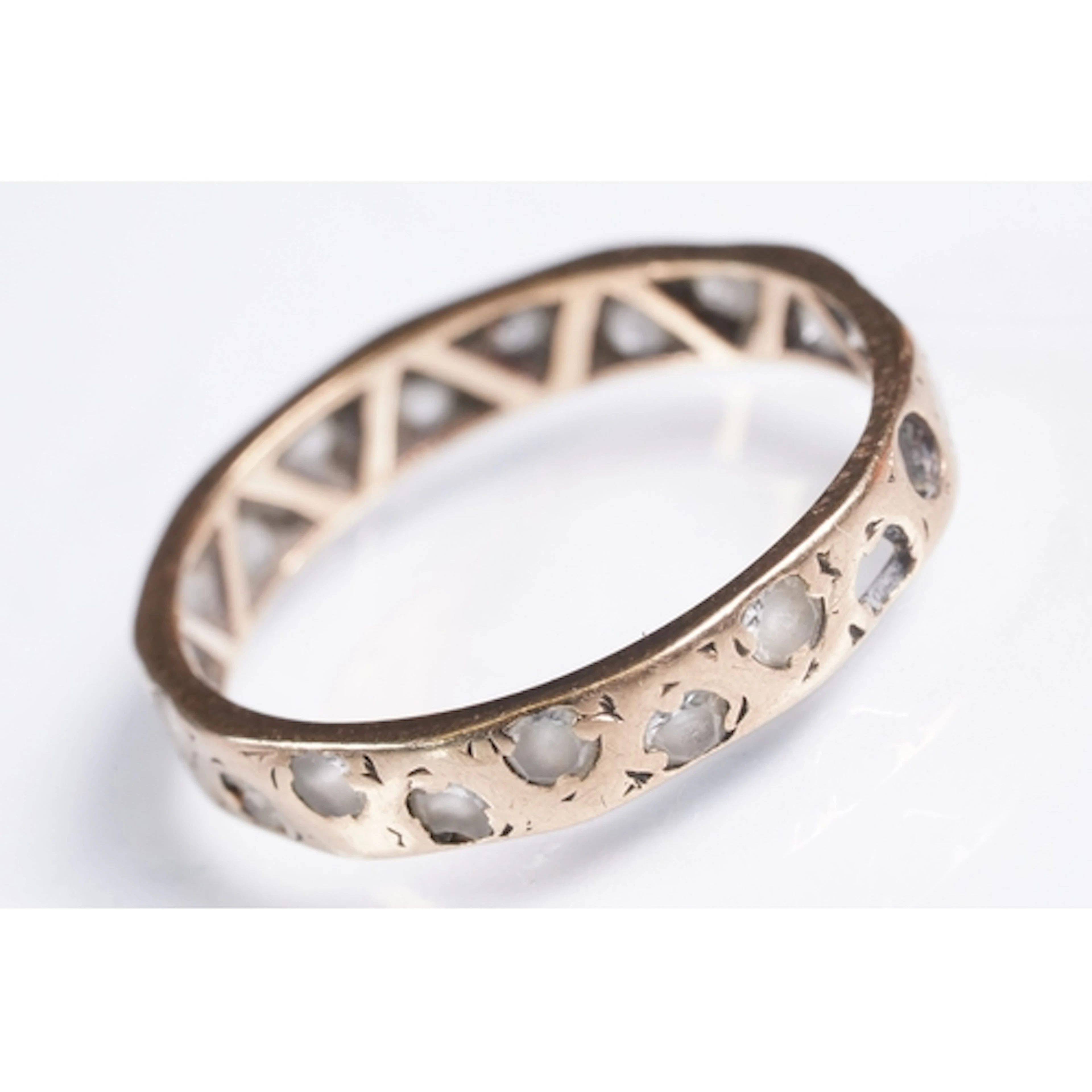 9ct gold and white stone full eternity ring. Marked 375. Siz...