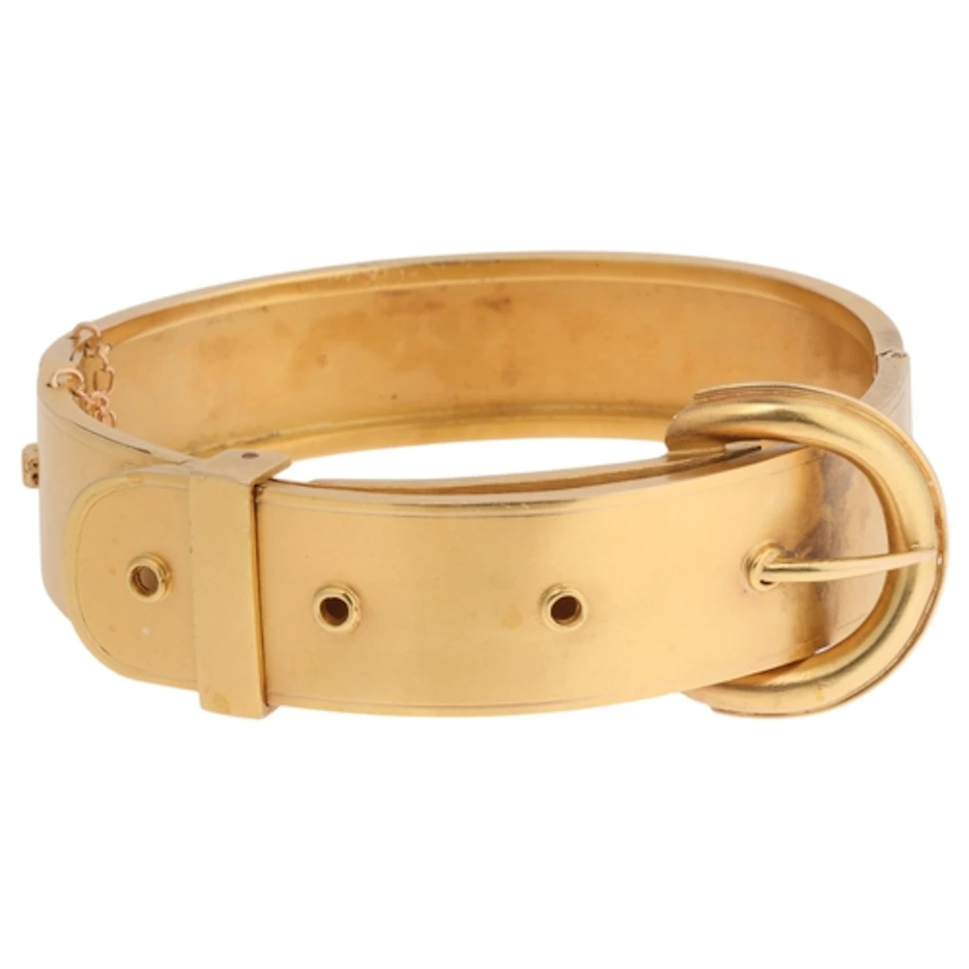 An Antique Victorian gold belt buckle hinged bangle, circa 1...