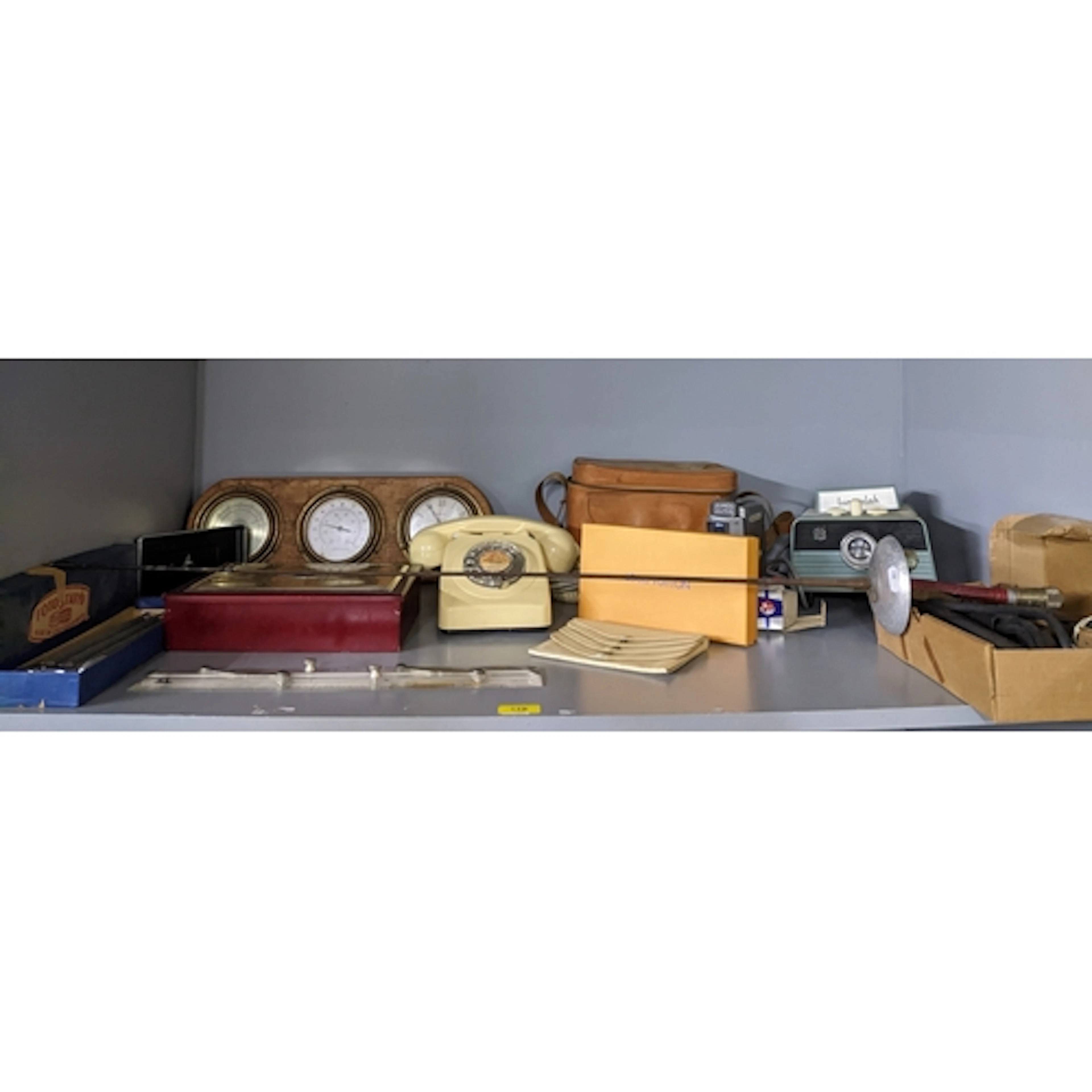 A mixed lot to include a vintage ivory coloured dial telepho...