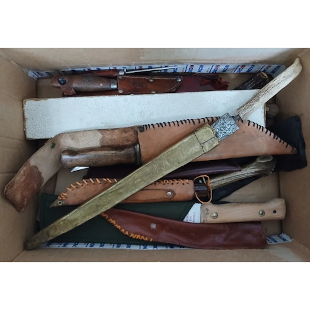 A box of assorted knives.