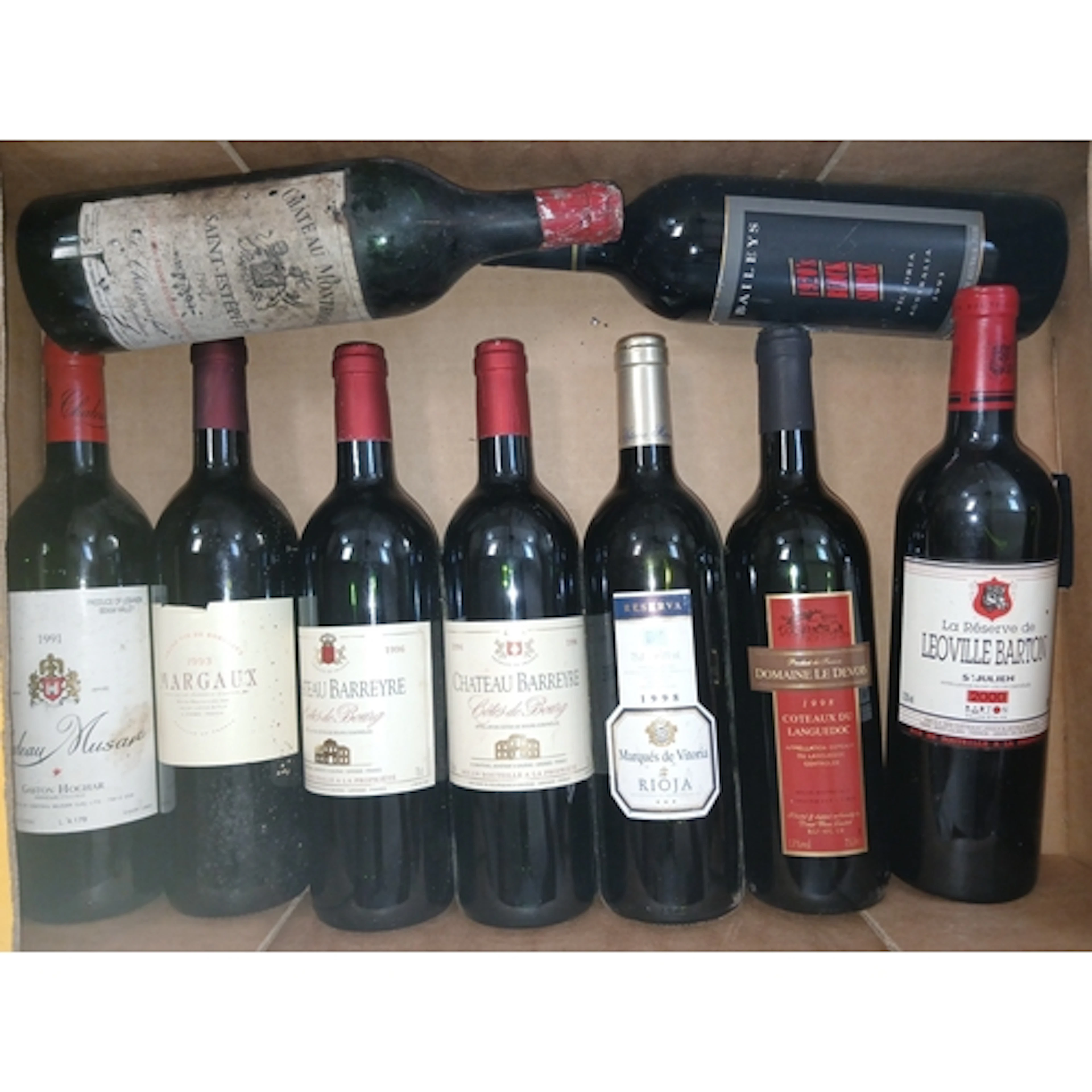 Nine bottles of assorted vintage red wine including Chateau ...