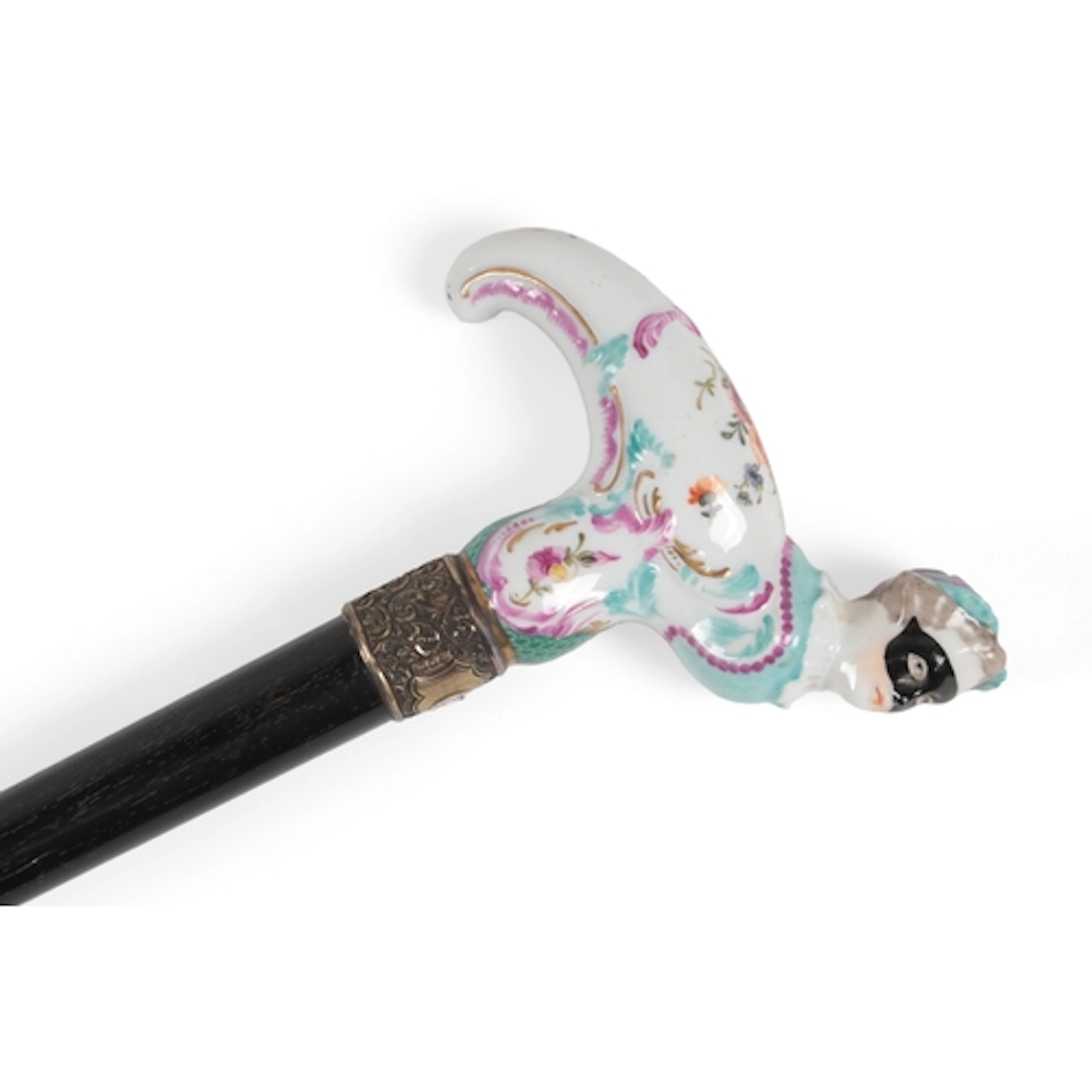 A Meissen porcelain handled walking cane, the handle termina...