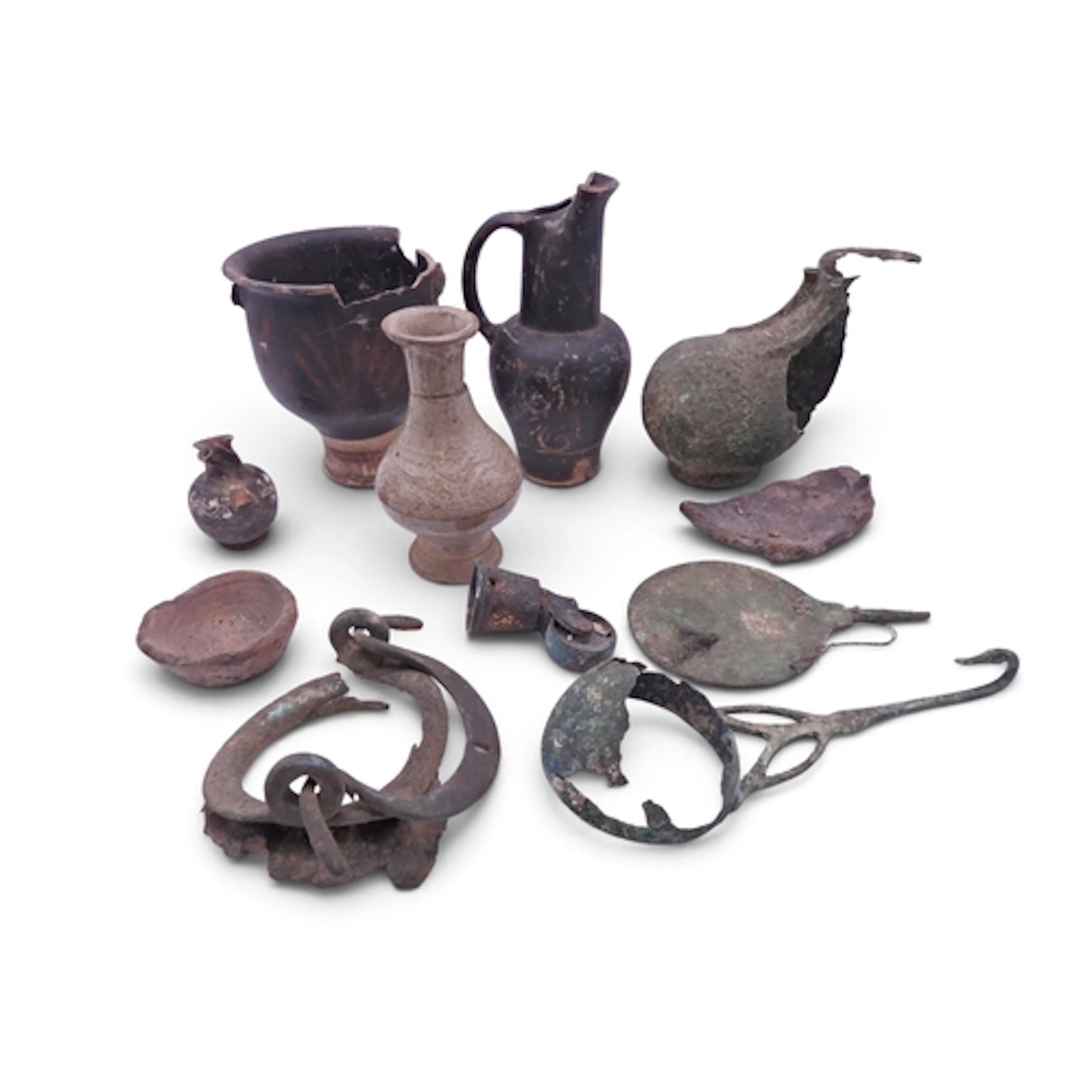 A group of archaeological artifacts Comprising;pottery...