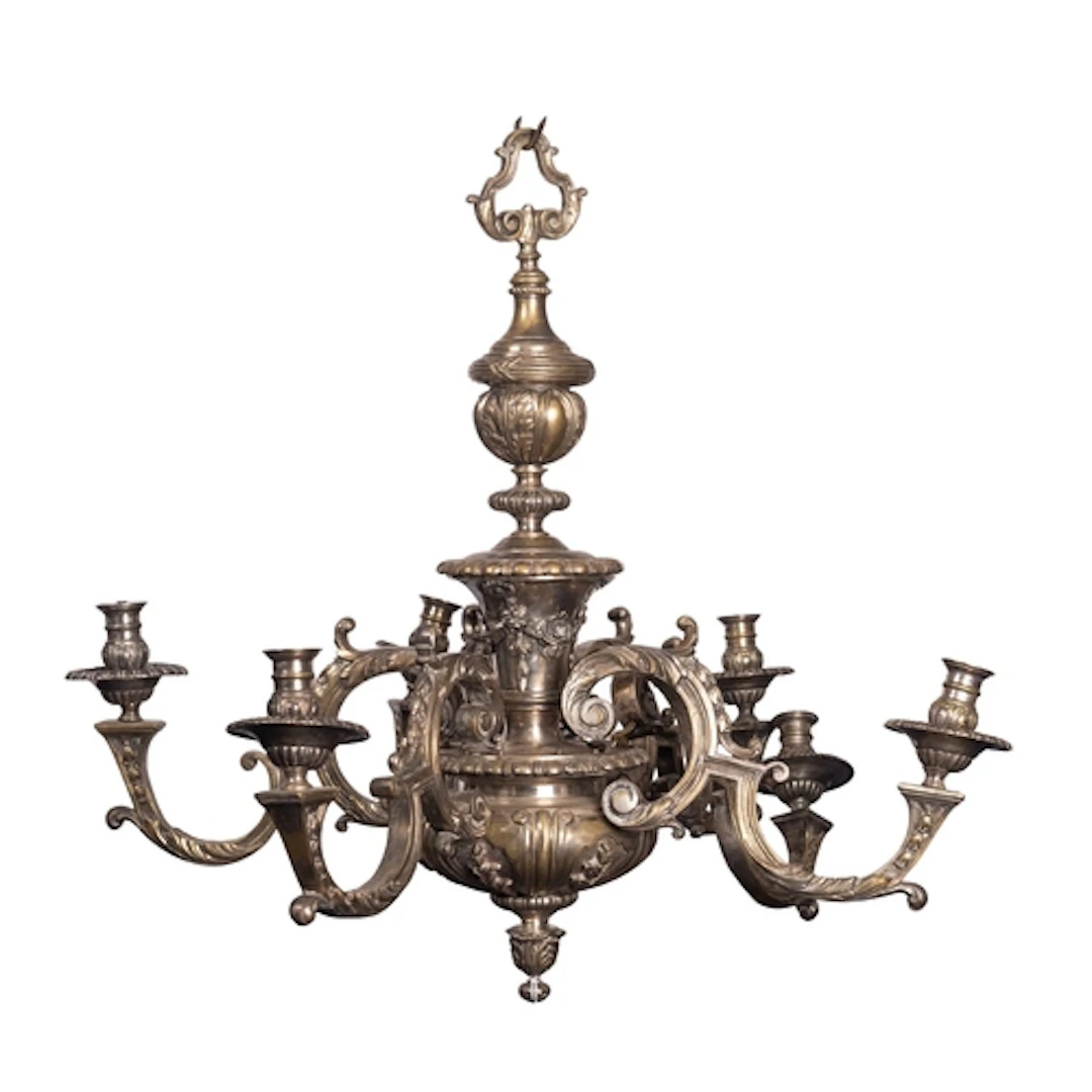 A silvered brass six light chandelier, in French Régence tas...