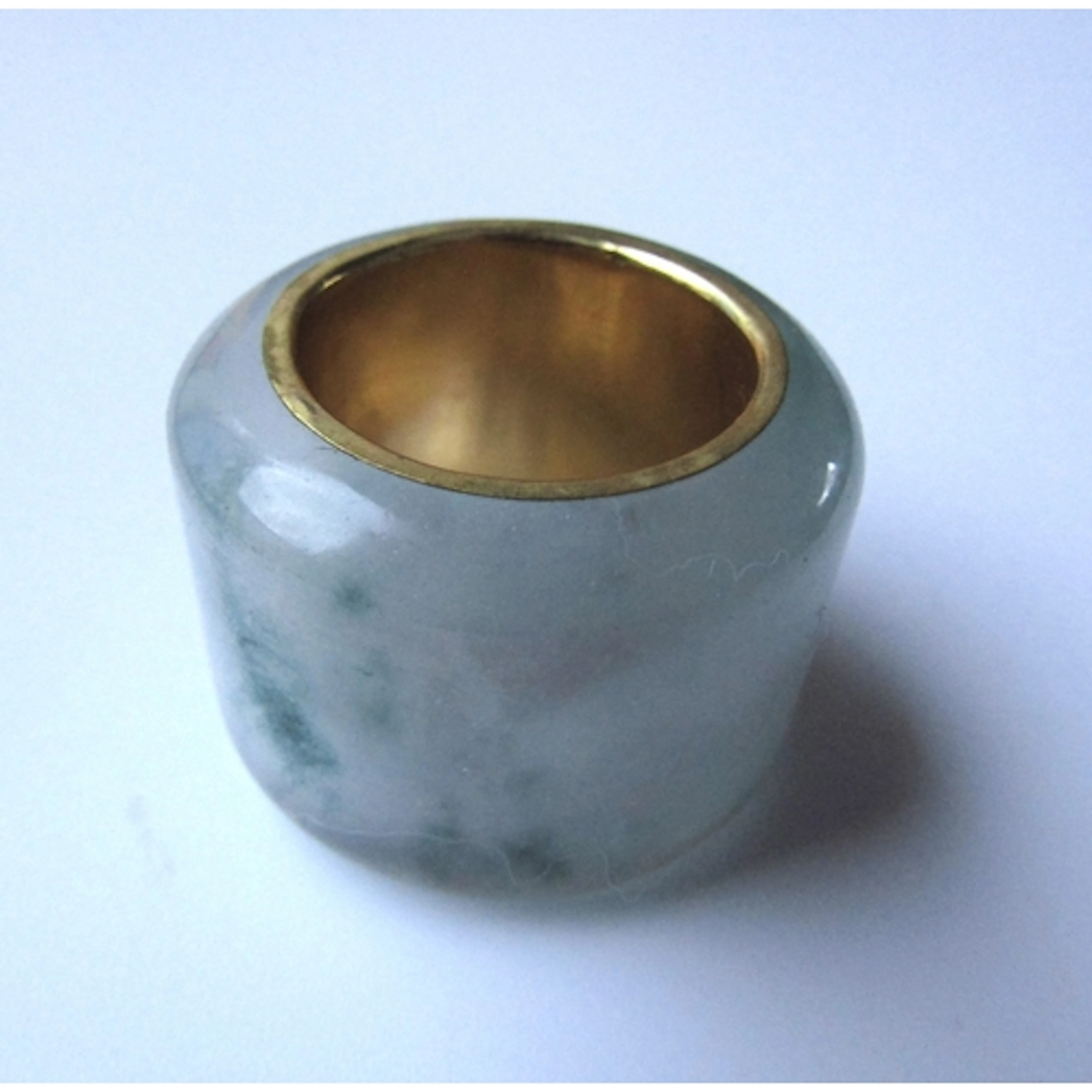 Eastern Gilded Jade Archers Ring Articulating Form