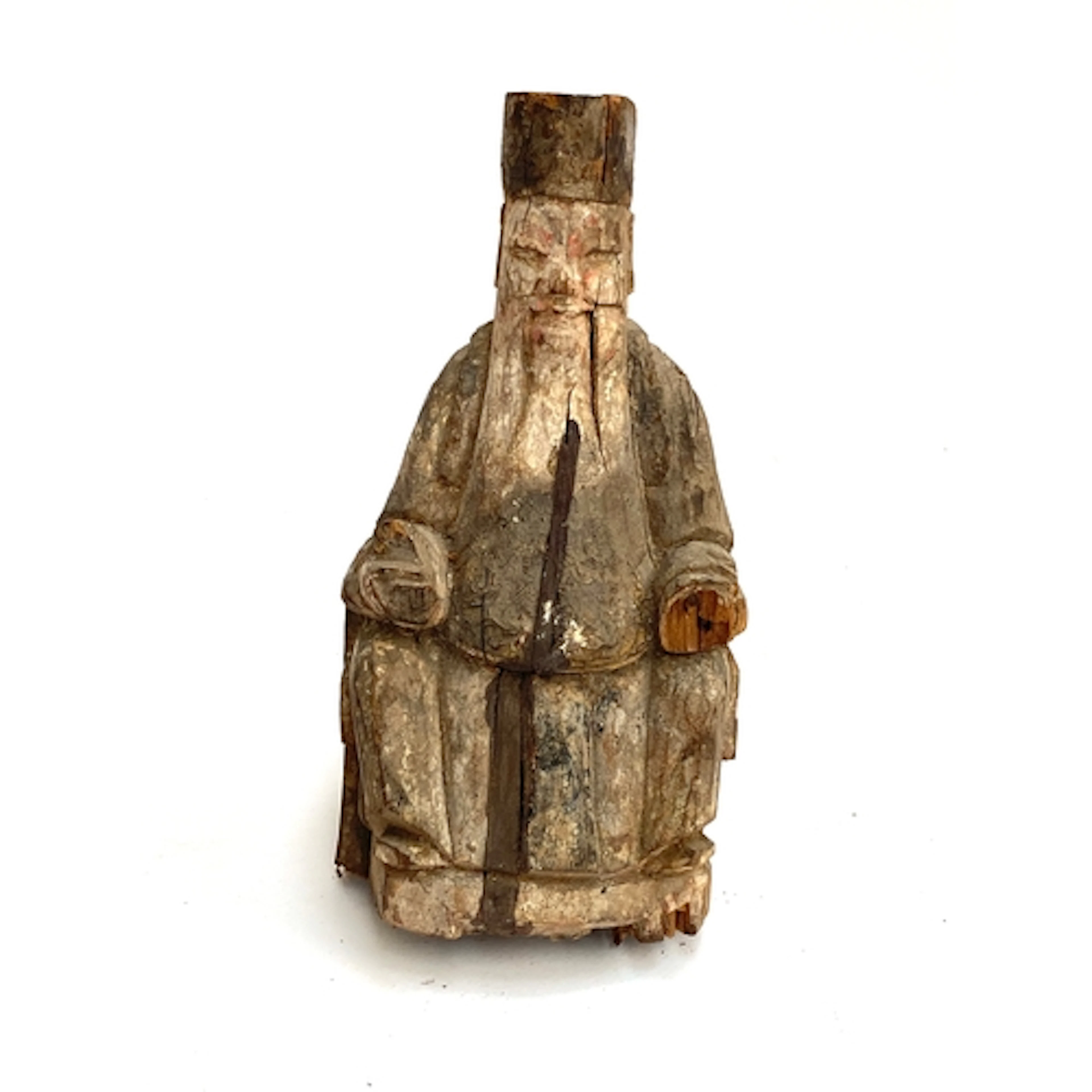 A Chinese Ming dynasty carved Camphor wood figure of a seate...