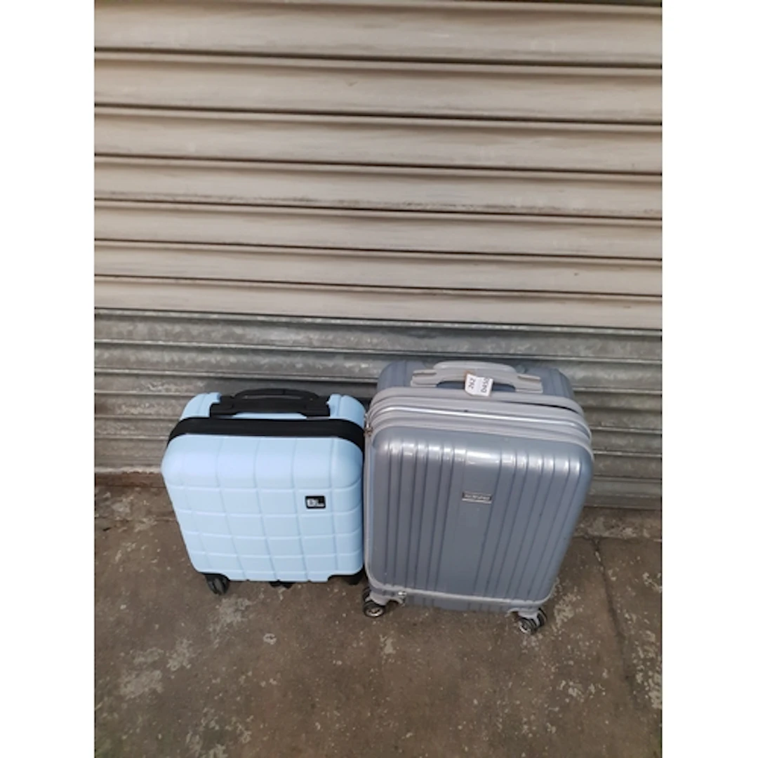 TWO SUITCASES including American Tourister and BL Note: case...
