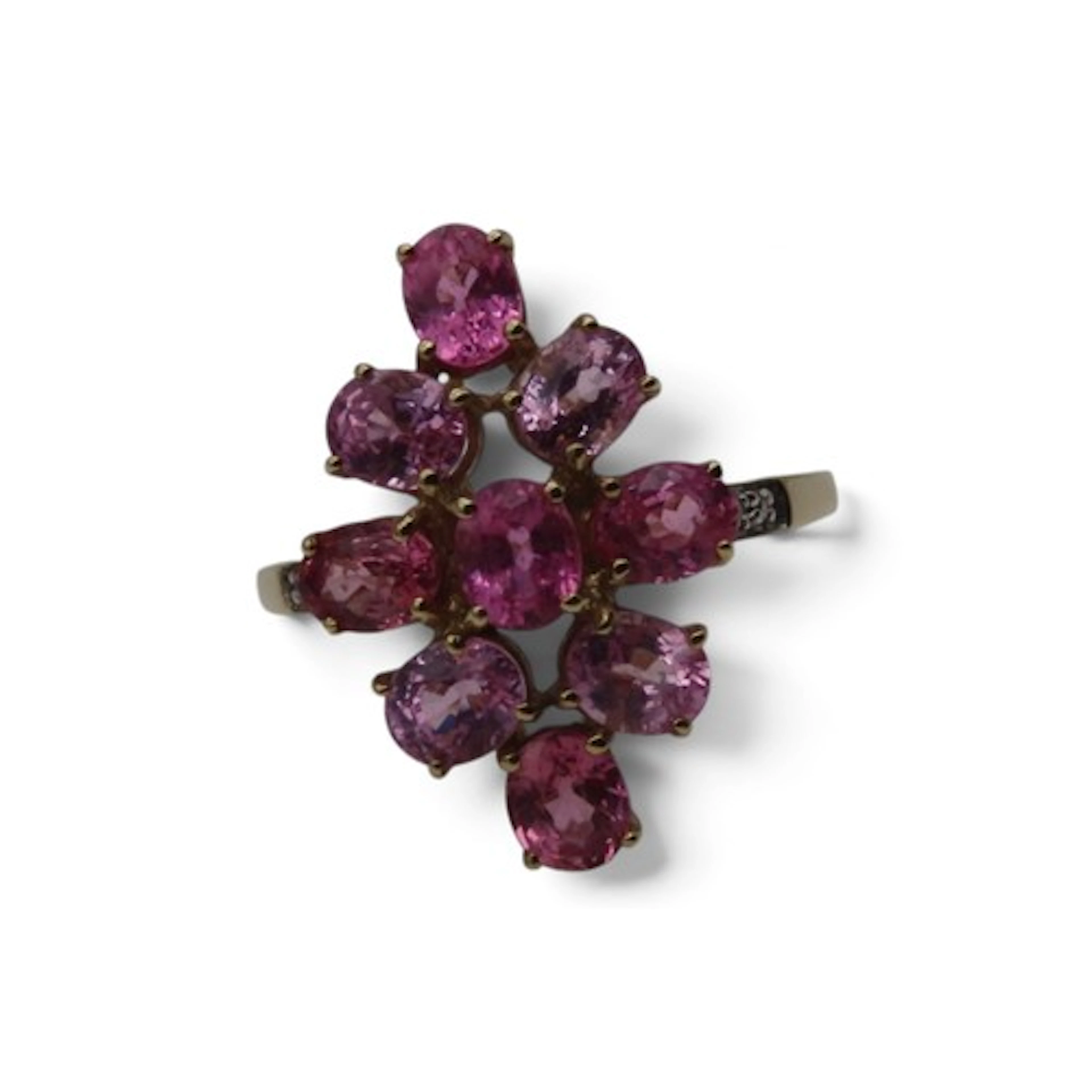 A pink sapphire and diamond ring, by Rocks & Co., set with n...